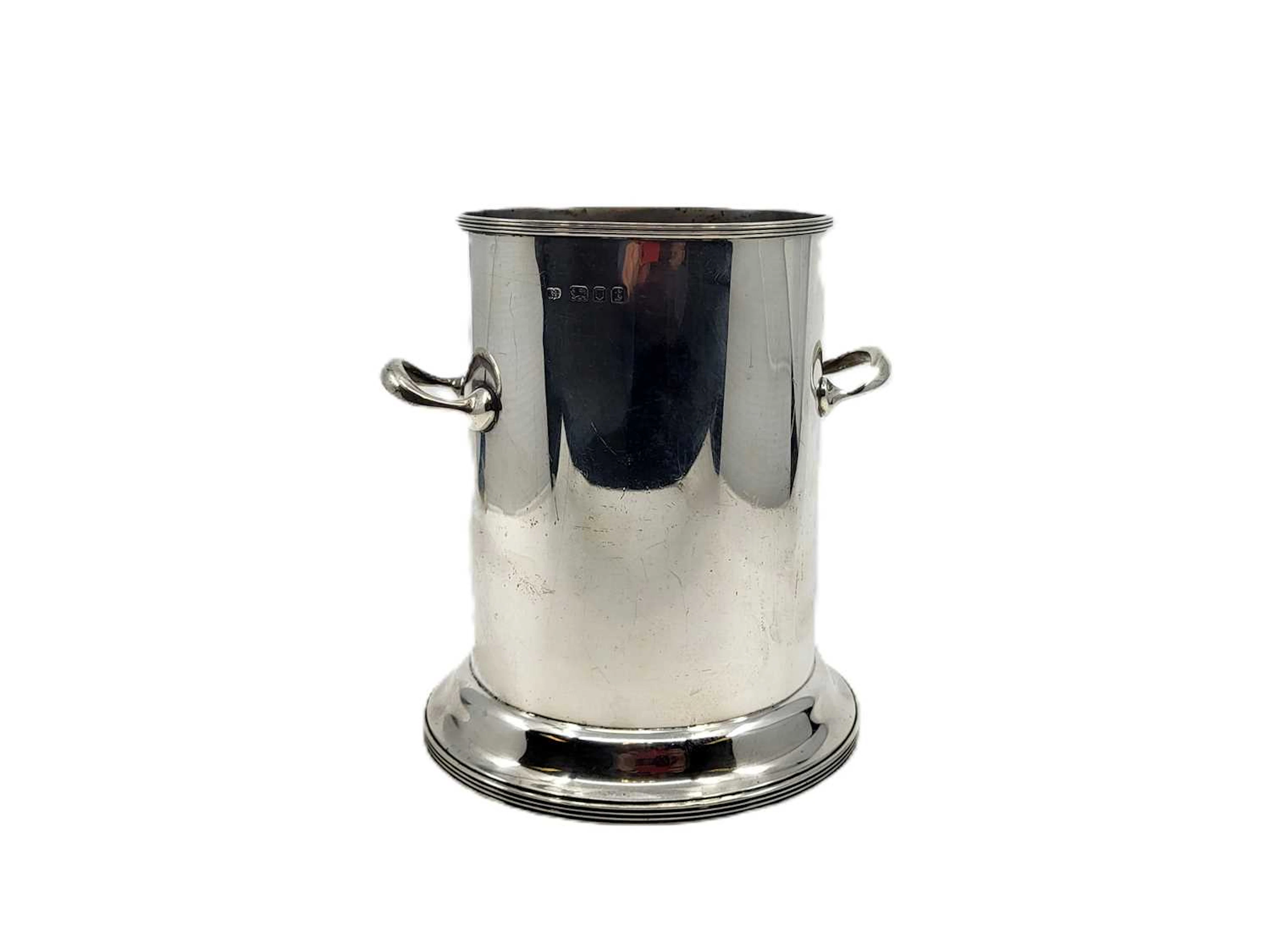 A GEORGE V STERLING SILVER (.925) TALL TWIN HANDLED WINE BOTTLE COOLER