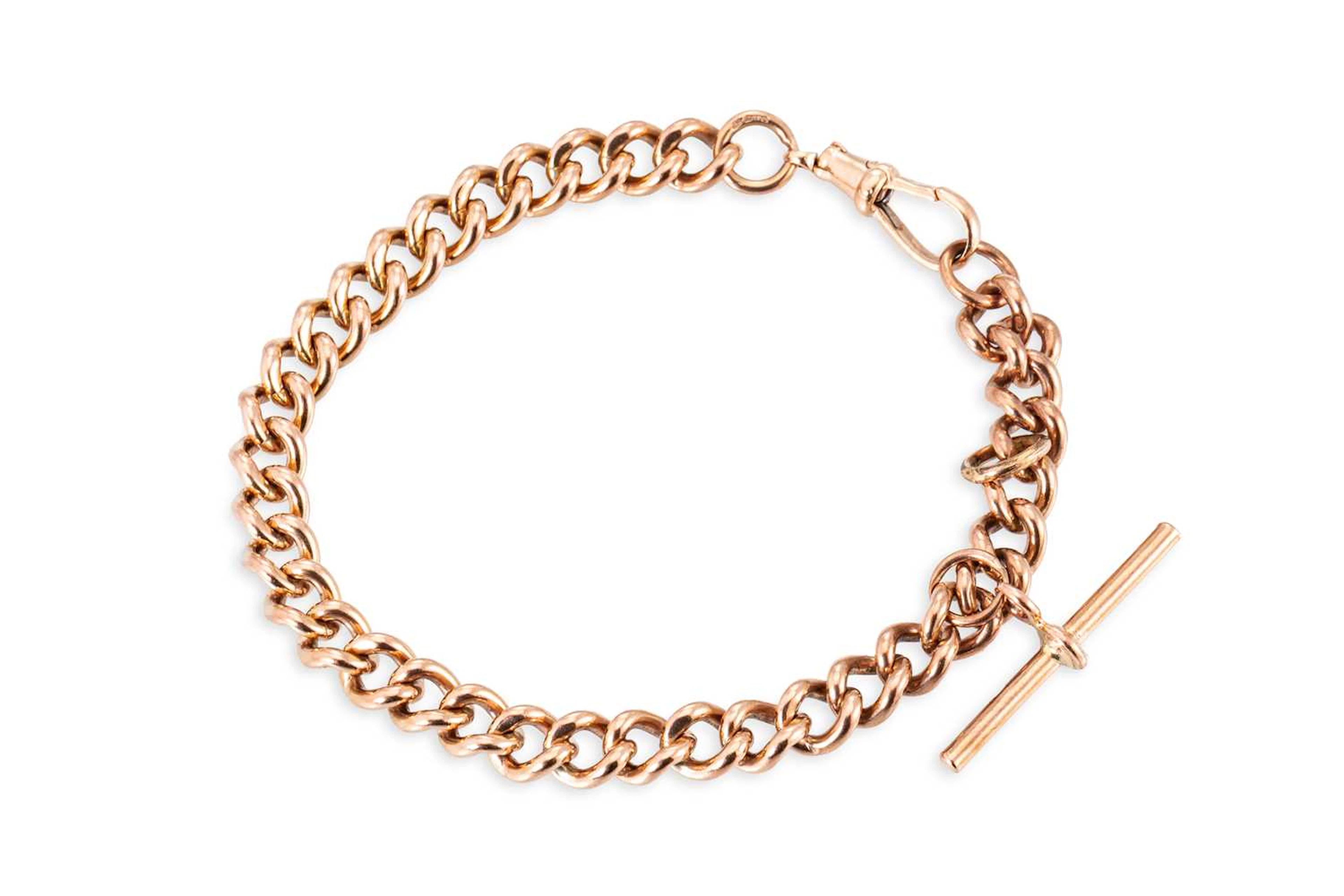 A 9CT GOLD CURB LNIK BRACELET