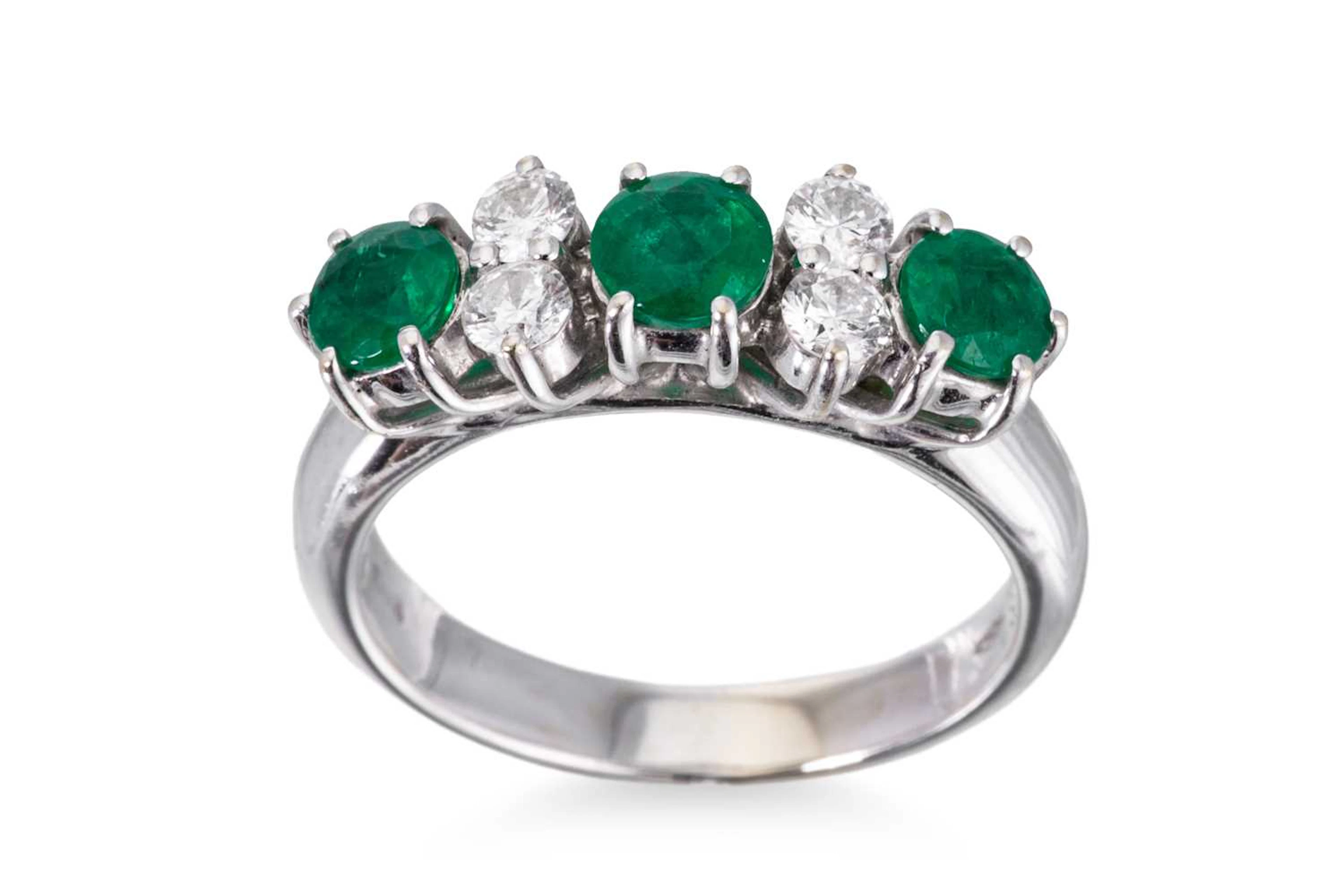 AN EMERALD AND DIAMOND RING