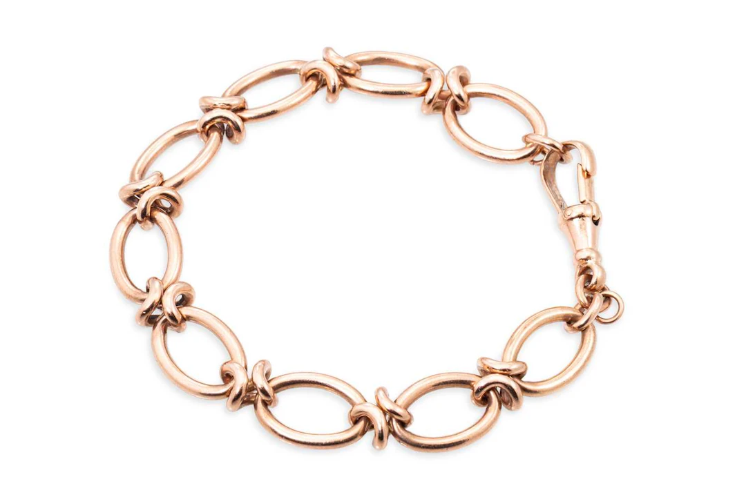 A 9CT GOLD FANCY LINK BRACELET