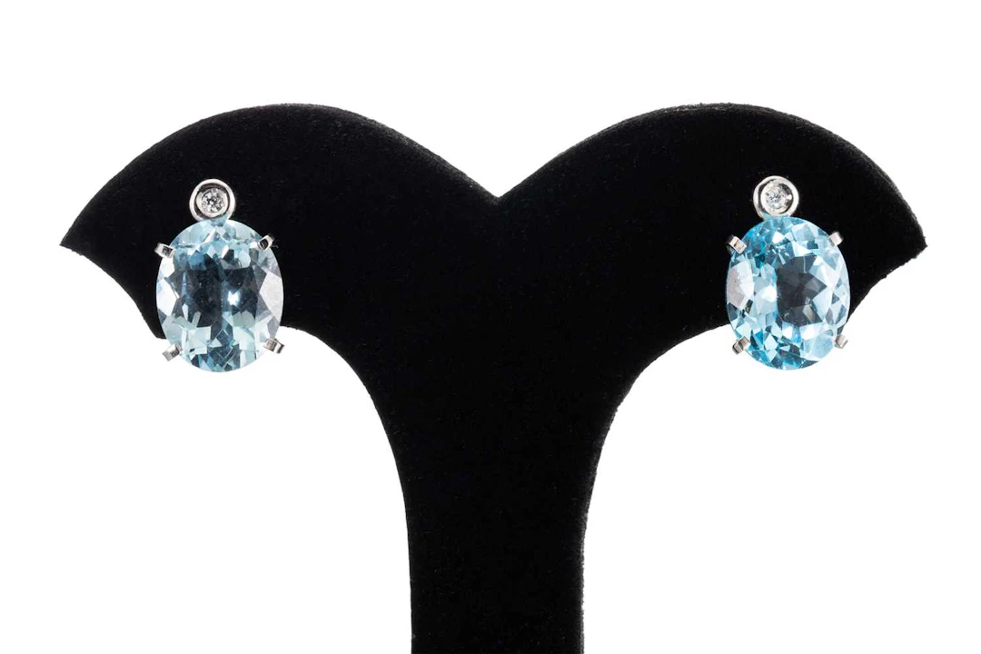 A PAIR OF TOPAZ AND DIAMOND EARRINGS