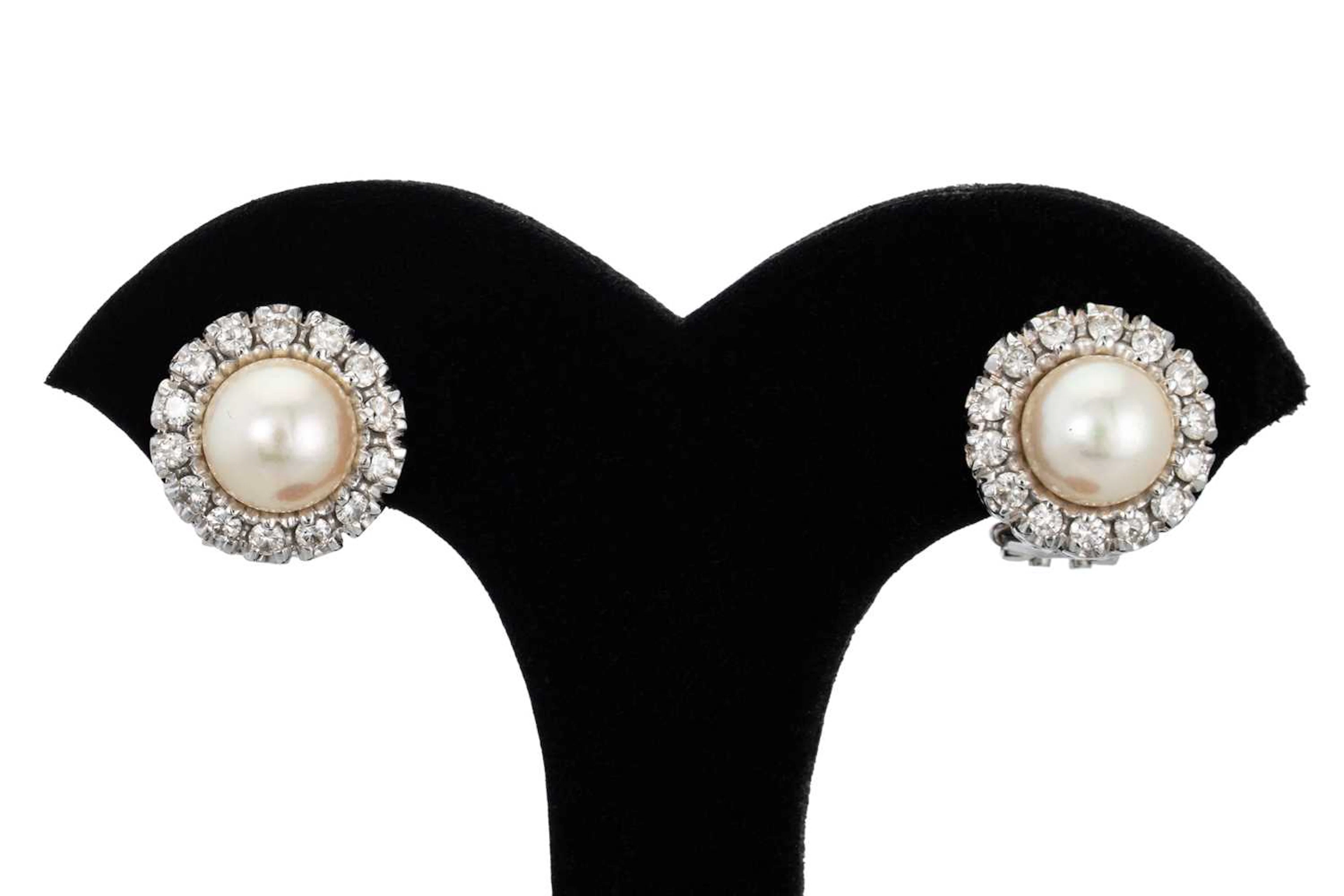 A PAIR OF CULTURED PEARL AND DIAMOND CLUSTER EARRINGS