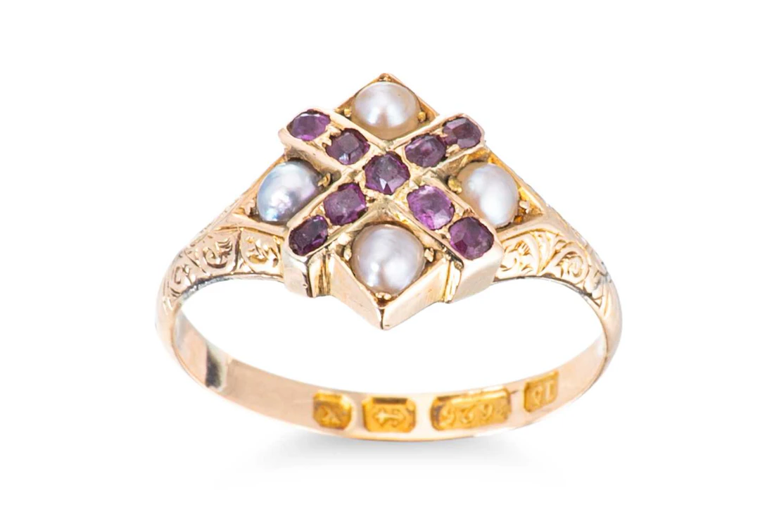 AN ANTIQUE PEARL AND RUBY RING