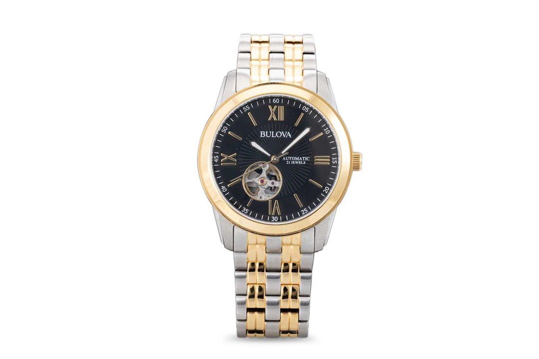 A BULOVA AUTOMATIC TWO TONE STAINLESS STEEL WRIST WATCH