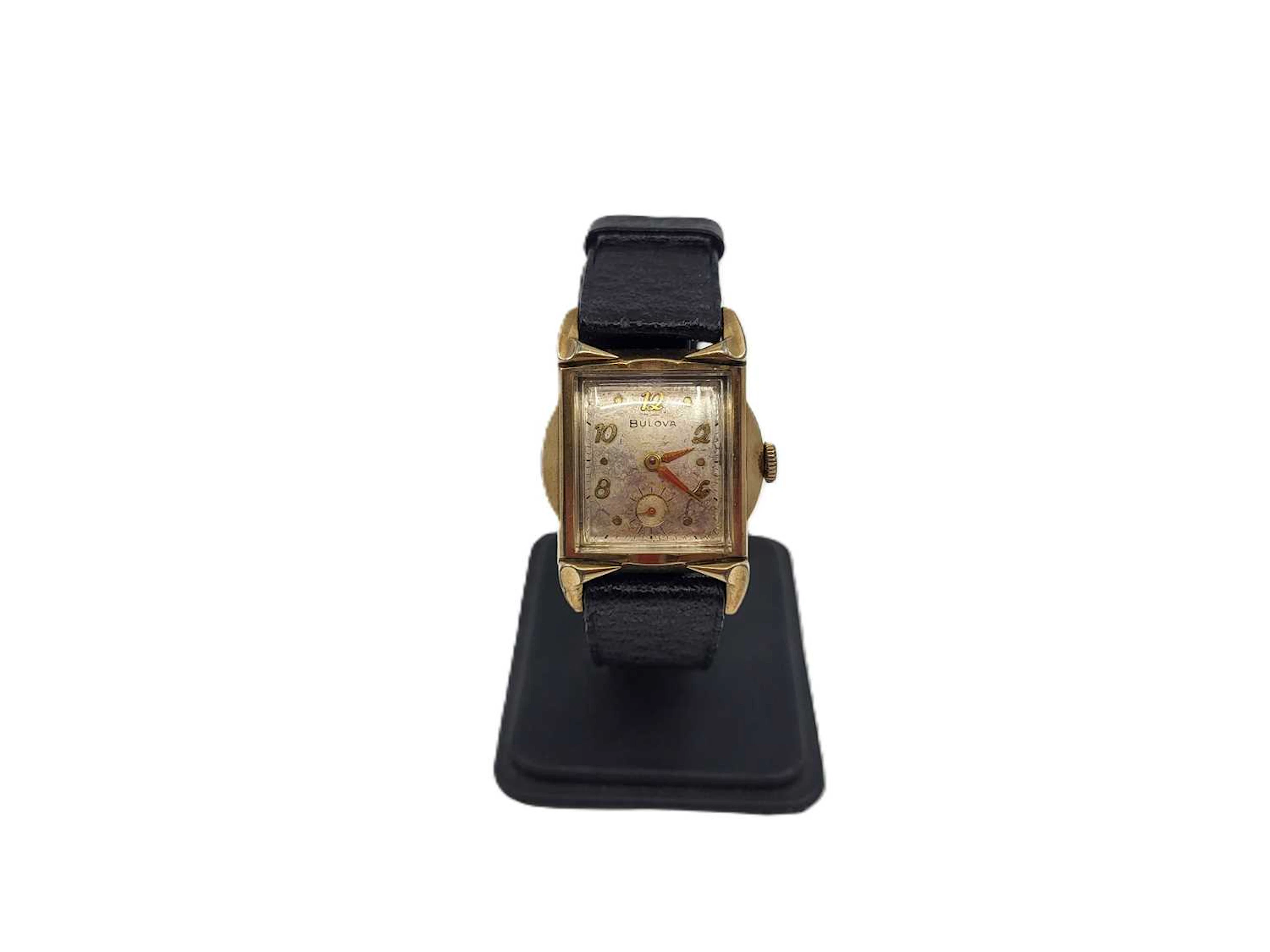 A VINTAGE BULOVA TANK