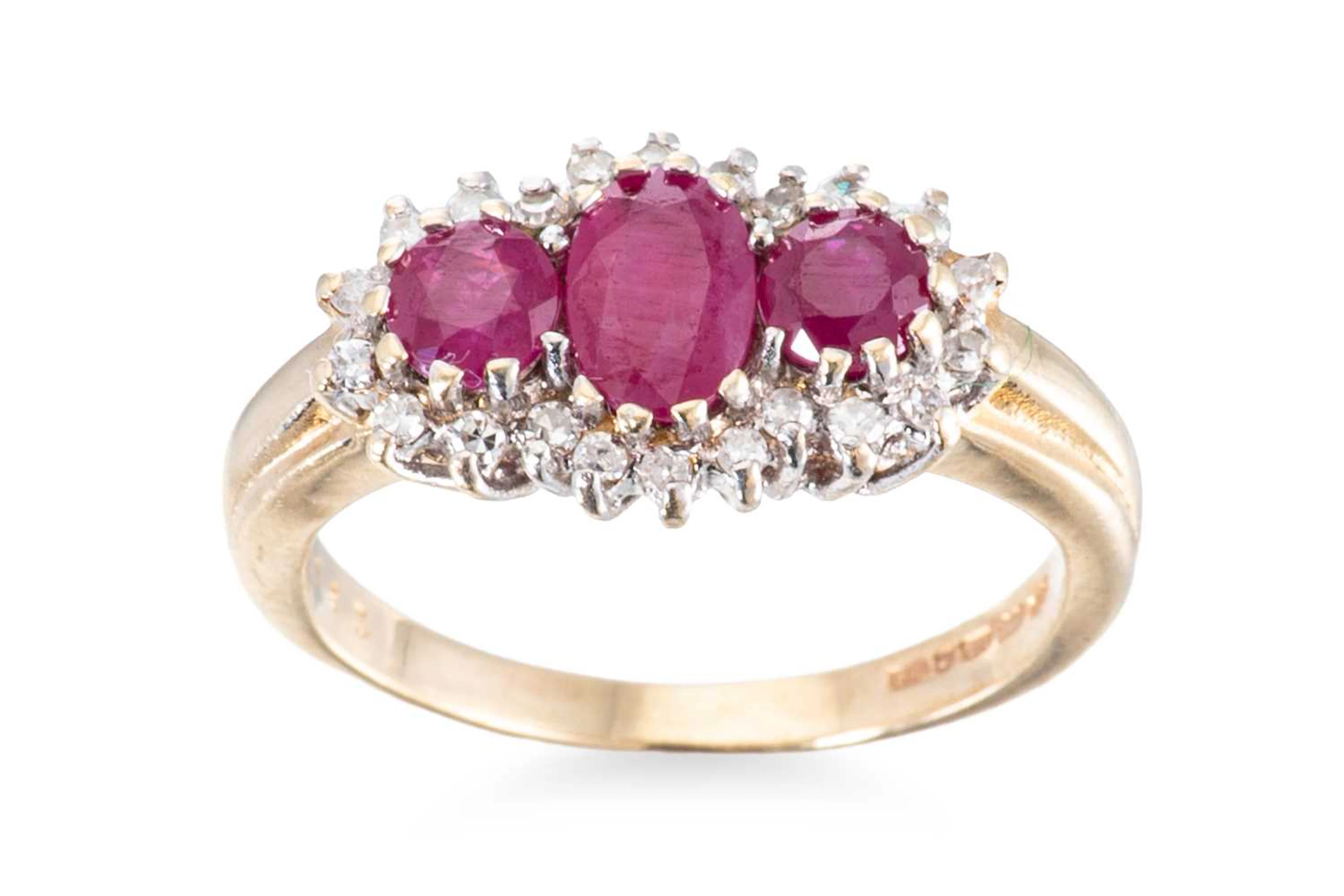 A RUBY AND DIAMOND CLUSTER RING