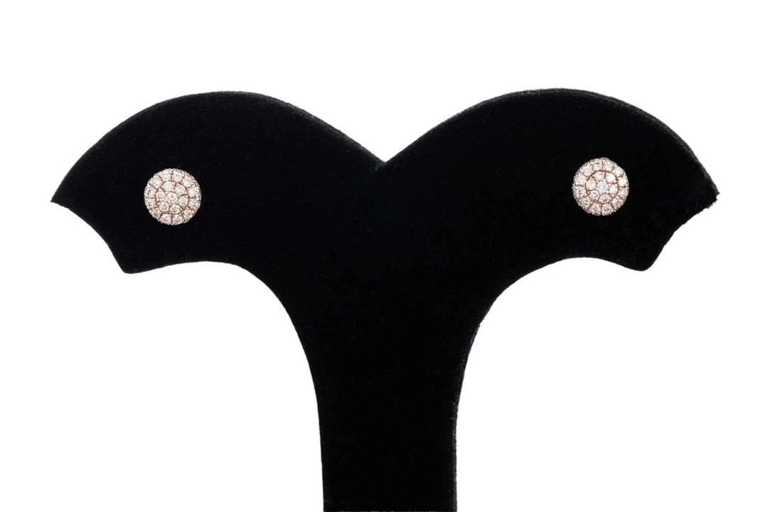 A PAIR OF DIAMOND CLUSTER EARRINGS