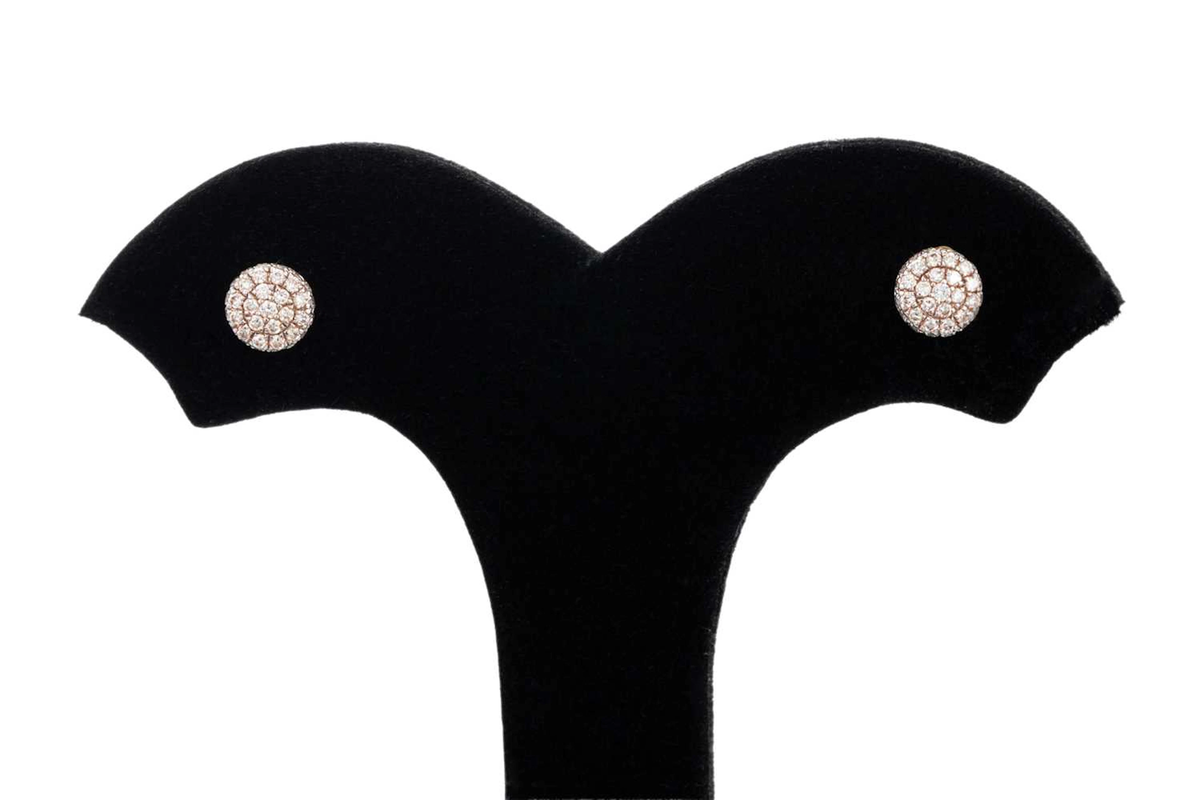 A PAIR OF DIAMOND CLUSTER EARRINGS