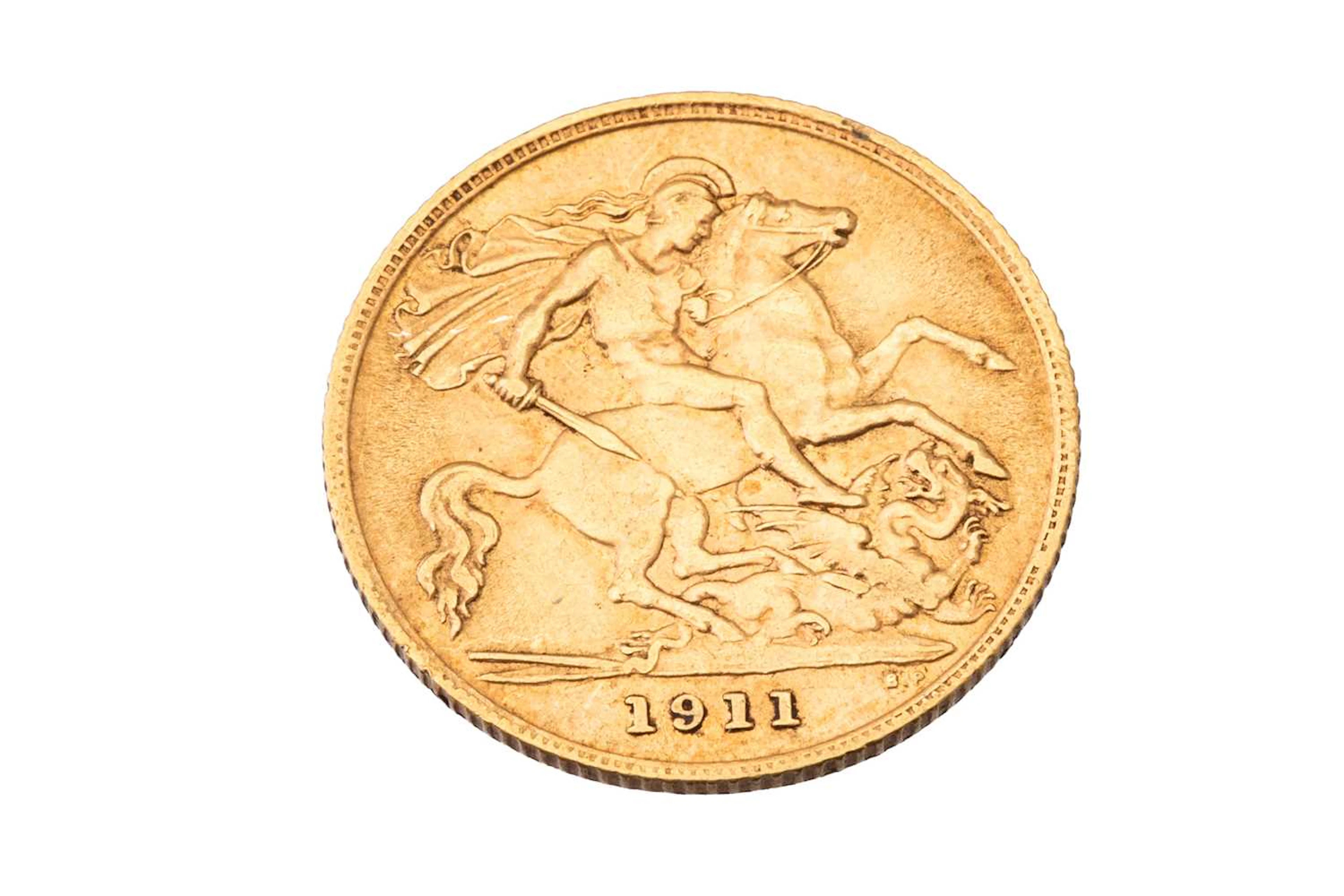 A 1911 GOLD HALF SOVEREIGN ENGLISH COIN