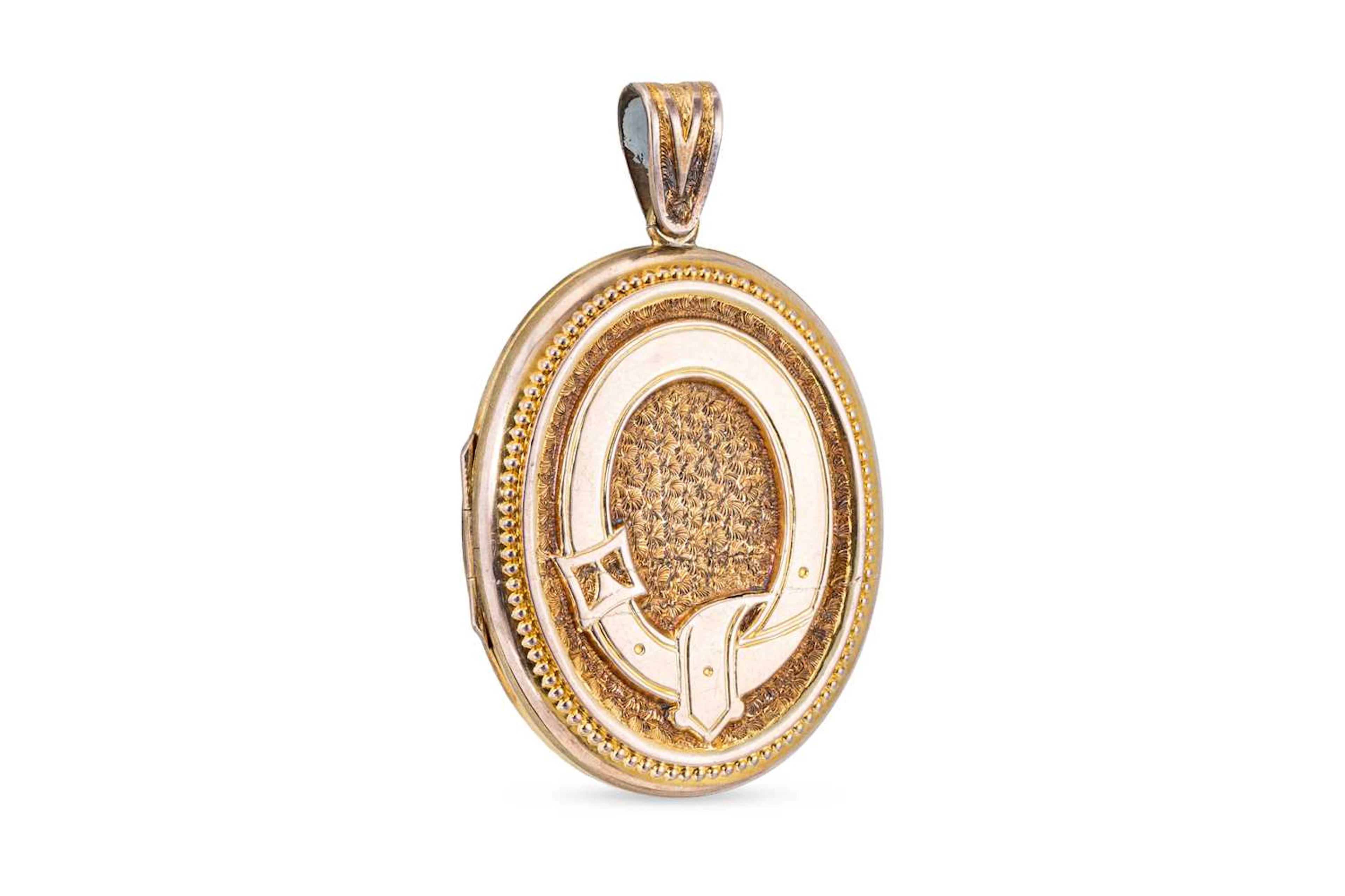A LATE VICTORIAN PART GOLD FRONT & BACK LOCKET
