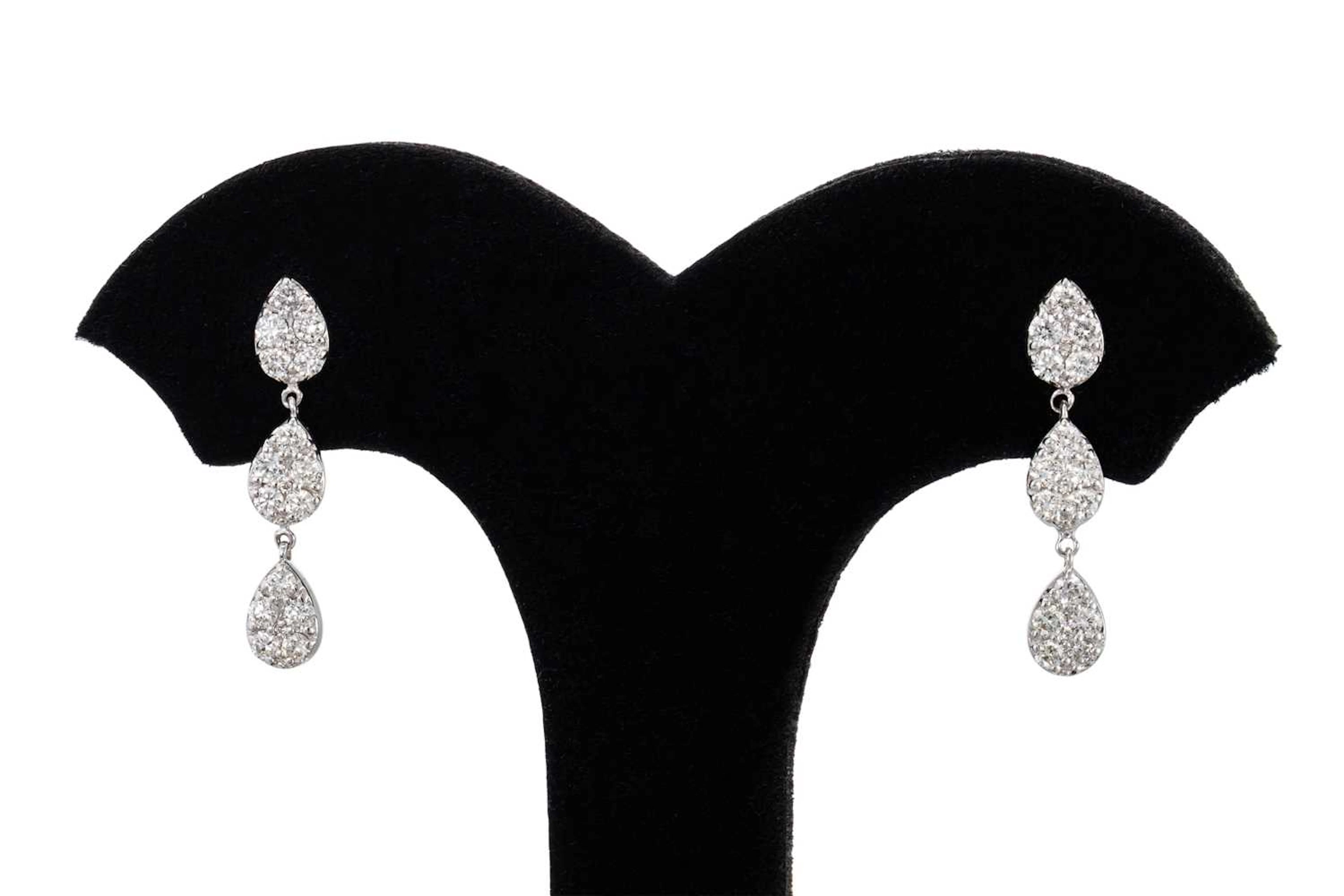 A PAIR OF DIAMOND TEARDROP CLUSTER EARRINGS