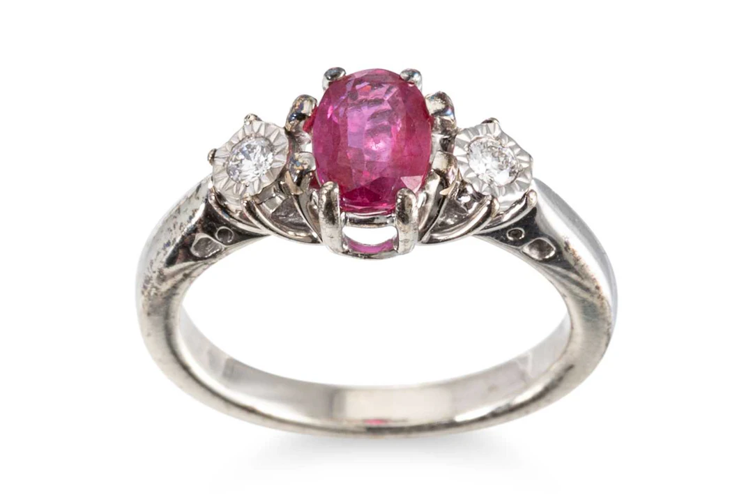 A RUBY AND DIAMOND THREE STONE RING