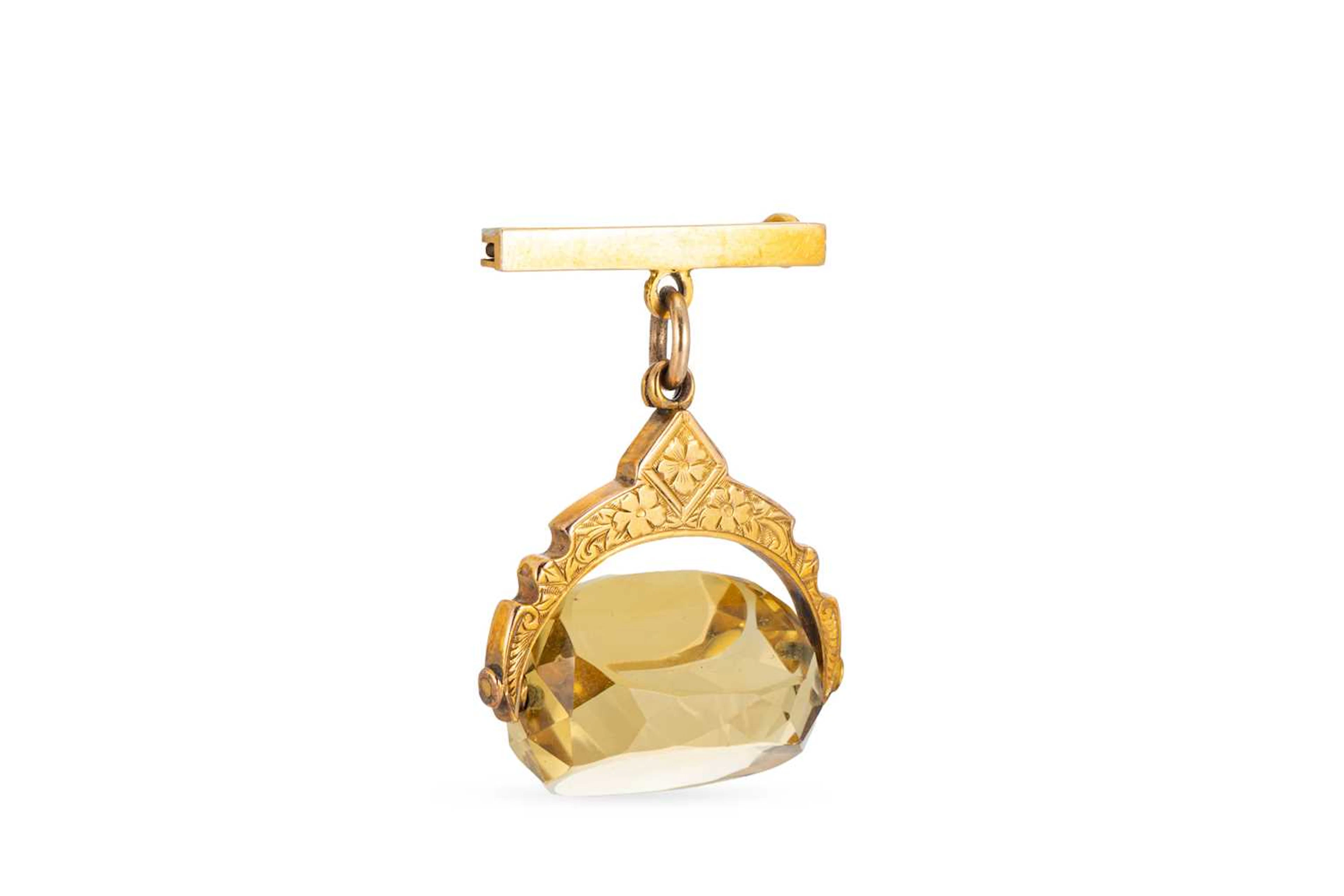 A 9CT GOLD SWIVEL SEAL