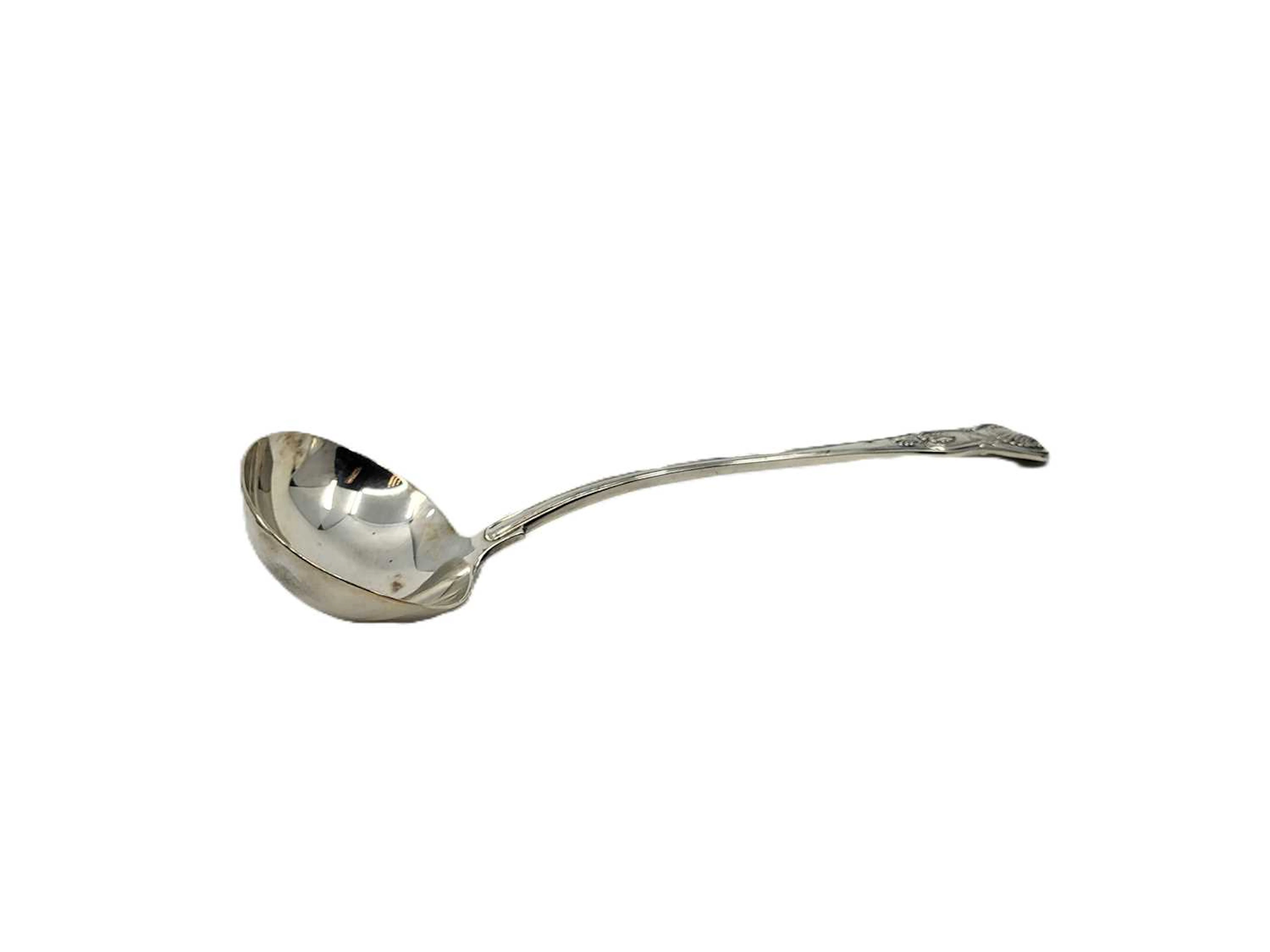 A WILLIAM IV ANTIQUE IRISH SILVER (.925) KING'S PATTERN BOW HANDLED SOUP LADLE
