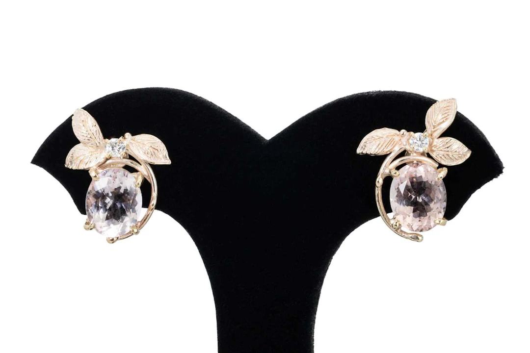 A PAIR OF MORGANITE AND DIAMOND SET EARRINGS