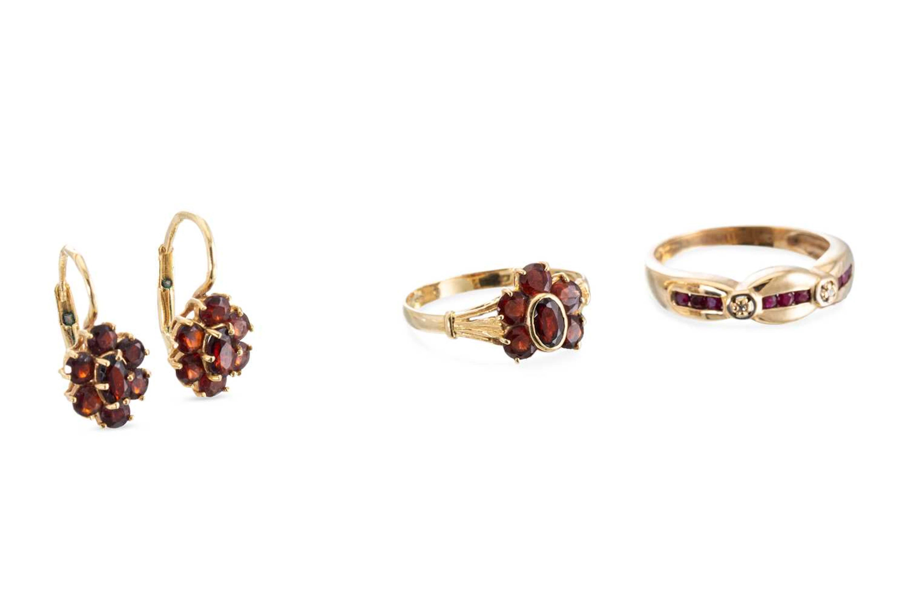 TWO GARNET SET RINGS