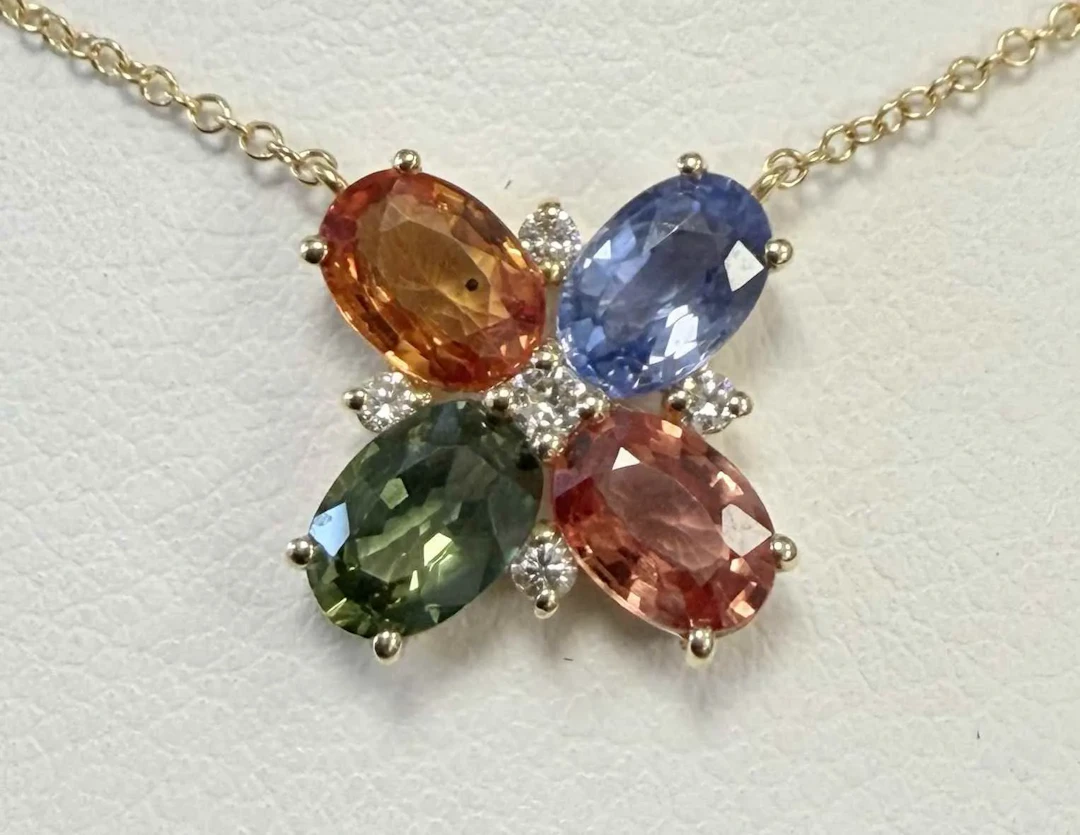 YELLOW GOLD NECKLACE FEATURING ORANGE, GREEN, AND BLUE SAPPH - Lot 43