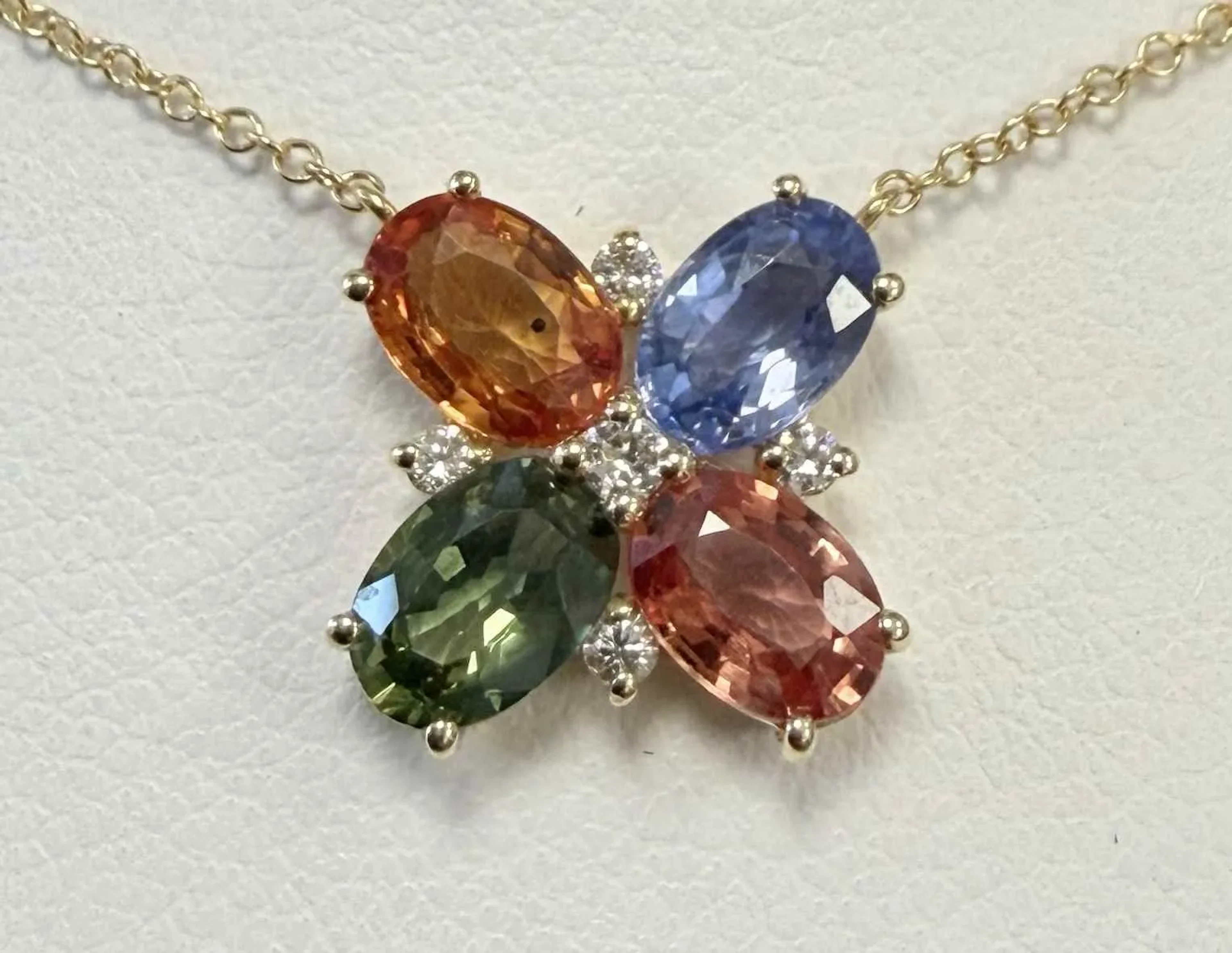 YELLOW GOLD NECKLACE FEATURING ORANGE, GREEN, AND BLUE SAPPH - Lot 43