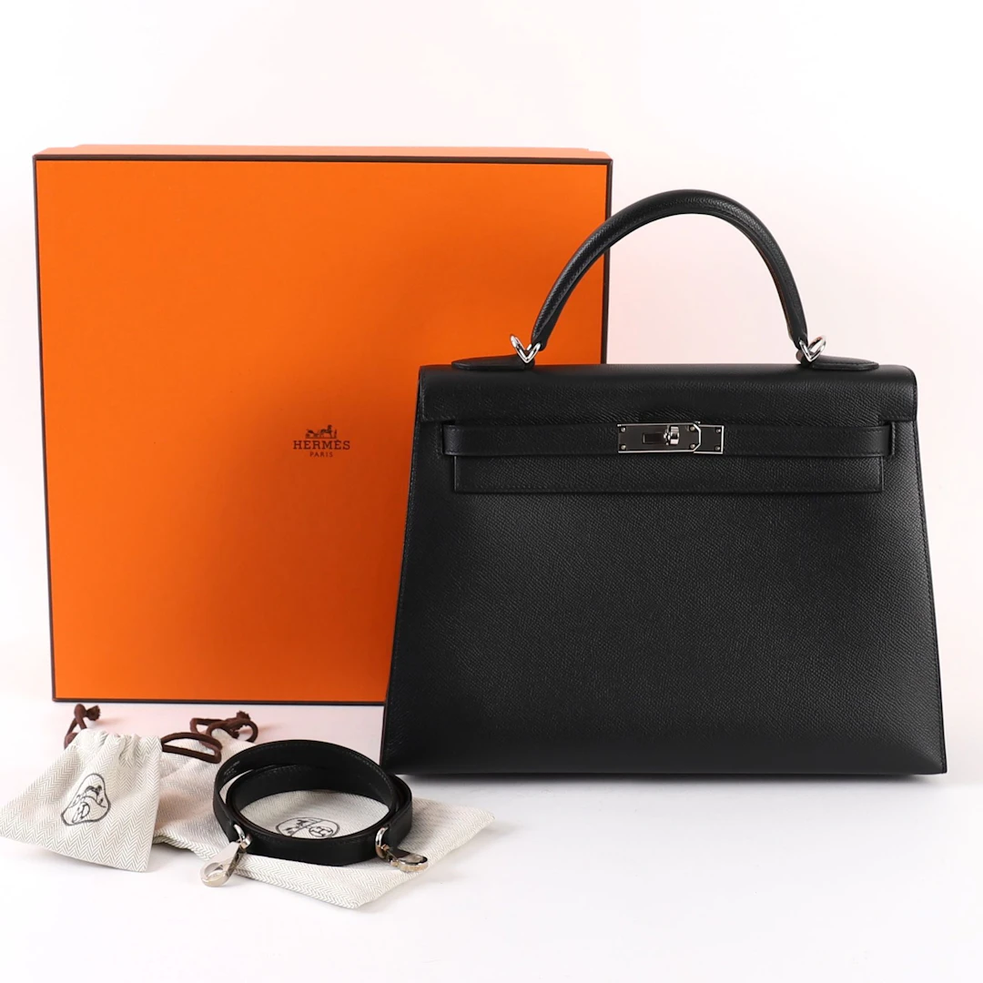 BLACK LEATHER HERMÈS KELLY BAG - Lot 121