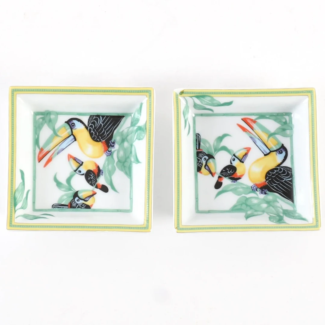 PAIR OF HERMÈS "TOUCANS" TRINKET DISHES - Lot 128