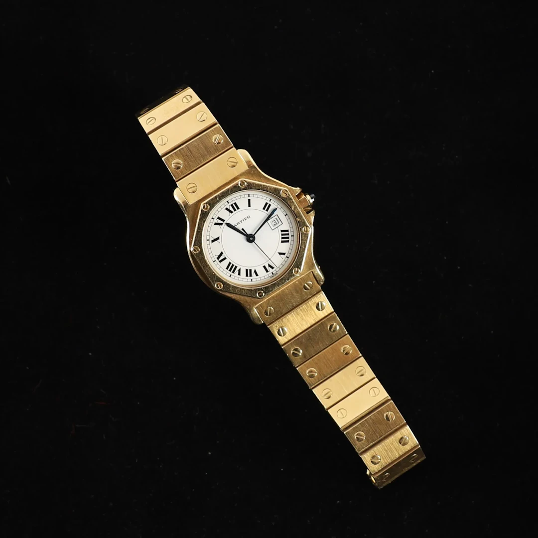 BEAUTIFUL "SANTOS OCTOGONALE" MEN'S WATCH BY CARTIER IN GOLD - Lot 95