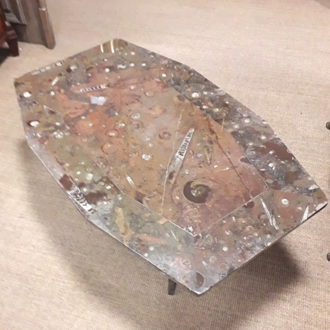 TABLE BASSE IN STONE AND FOSSIL by Christian PINGUAUD (XX) - Lot 313