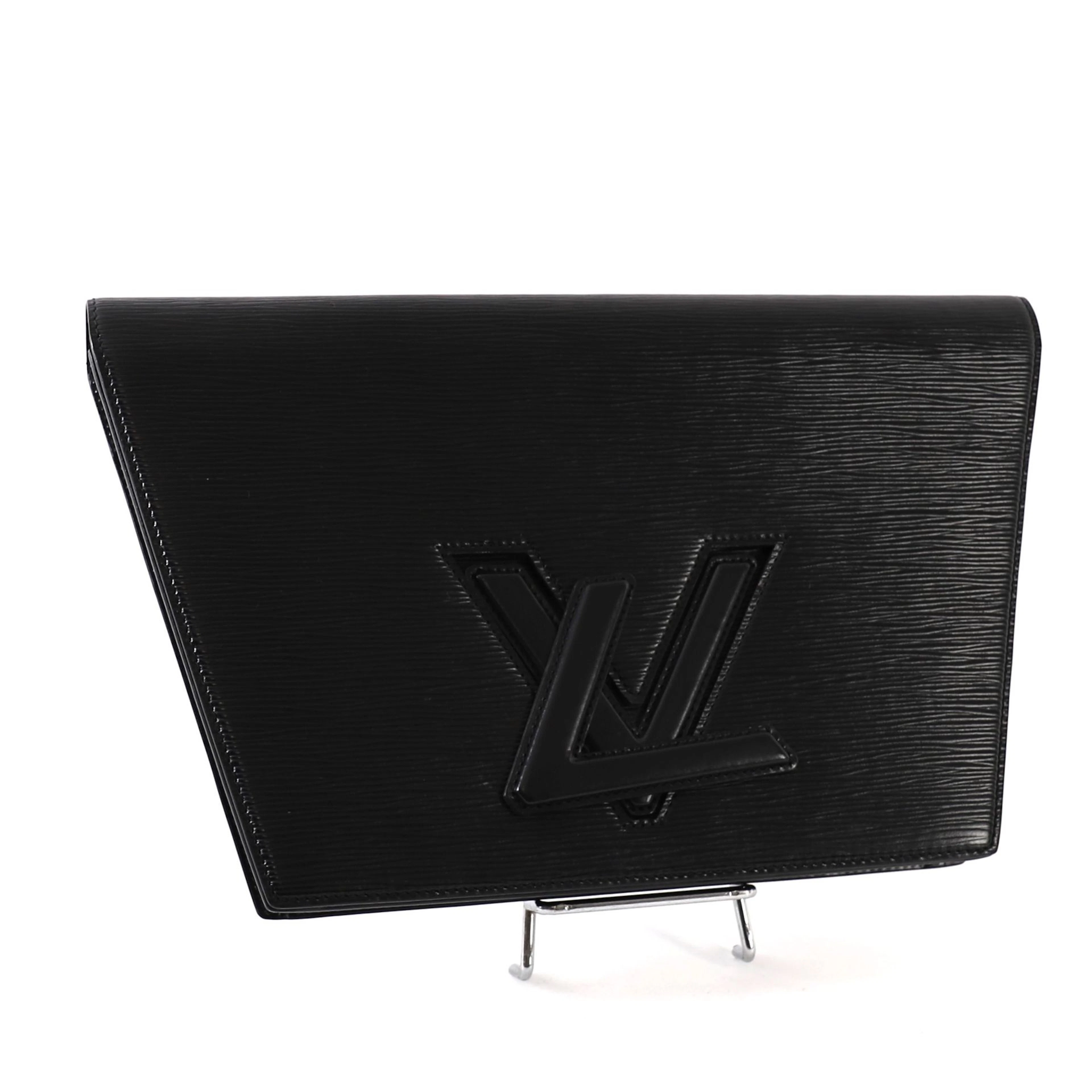LOUIS VUITTON "TRAPÈZE" CLUTCH - Lot 105
