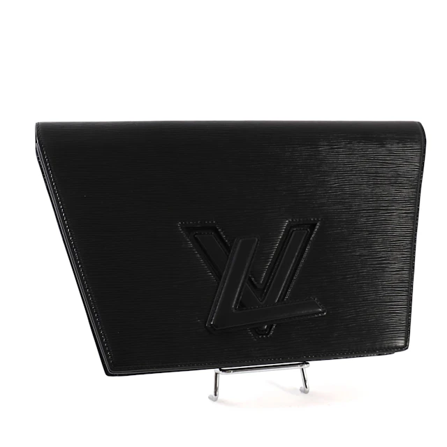 LOUIS VUITTON "TRAPÈZE" CLUTCH - Lot 105