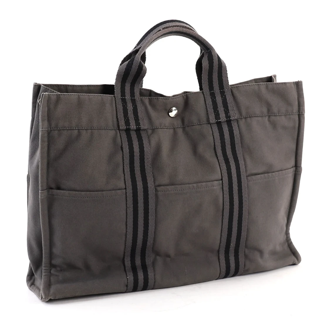 LARGE "TOTO BAG" CANVAS TOTE BY HERMÈS - Lot 124