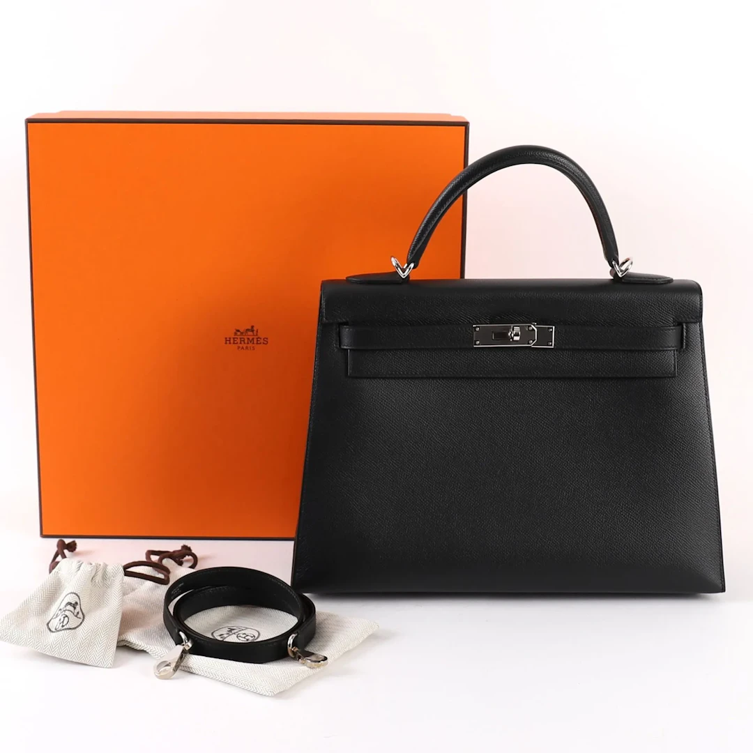 BLACK LEATHER HERMÈS KELLY BAG - Lot 121
