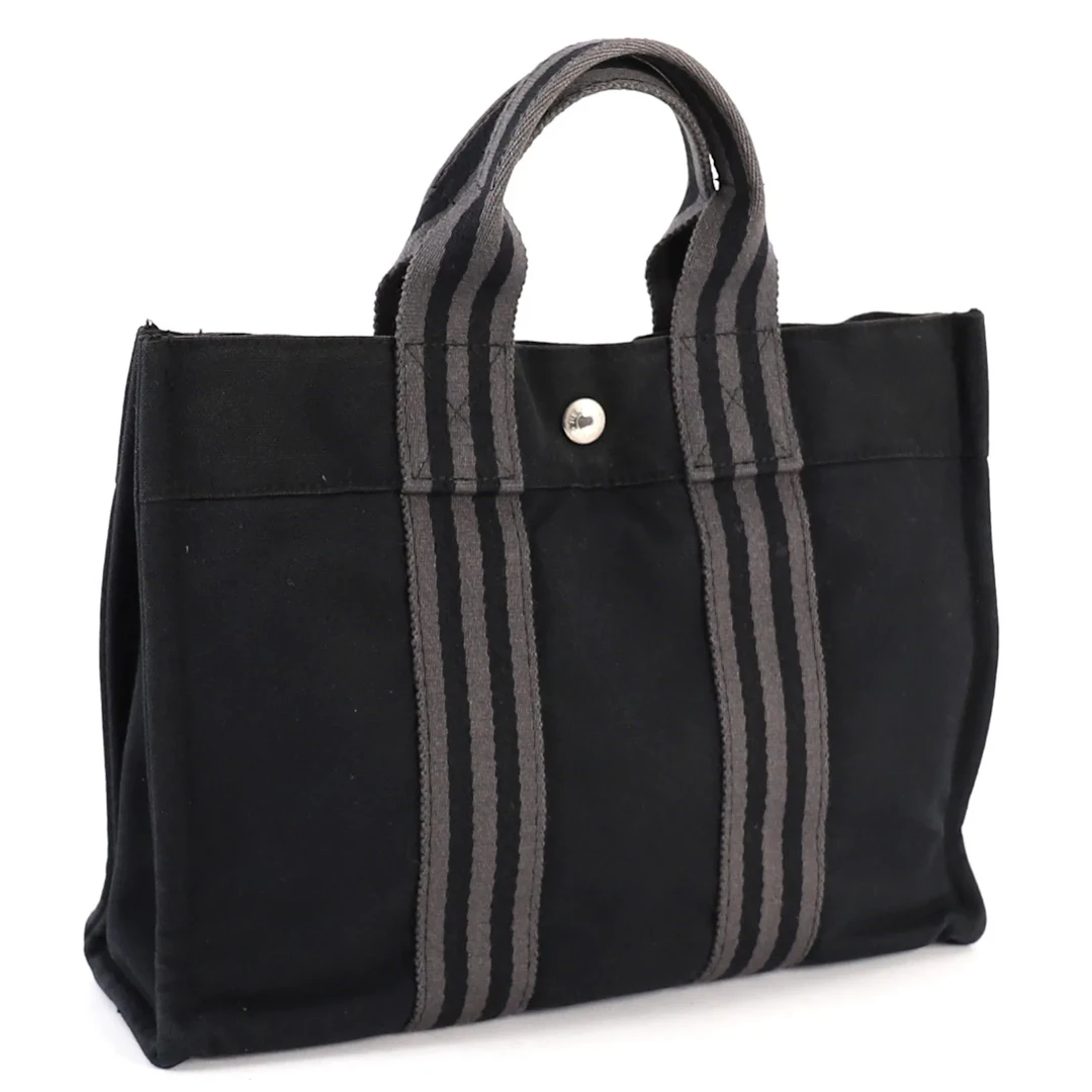 SMALL HERMÈS CANVAS "TOTO BAG" TOTE - Lot 125