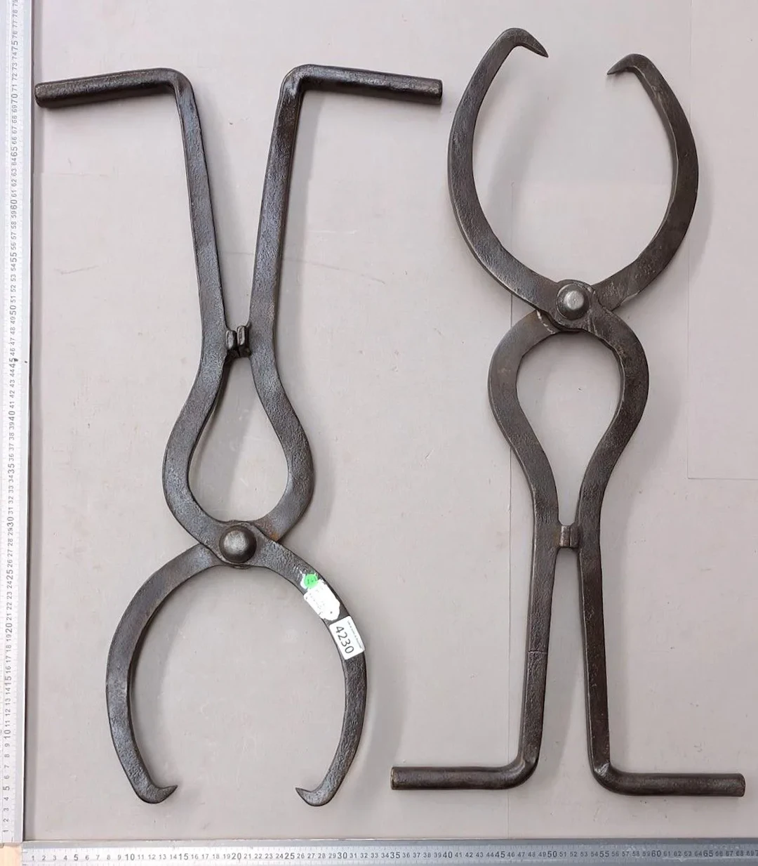 2 steel railroad clamps—see photos for dimensions and condition