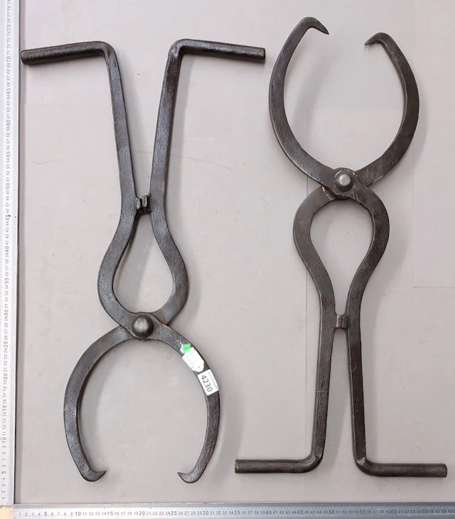 2 steel railroad clamps—see photos for dimensions and condition