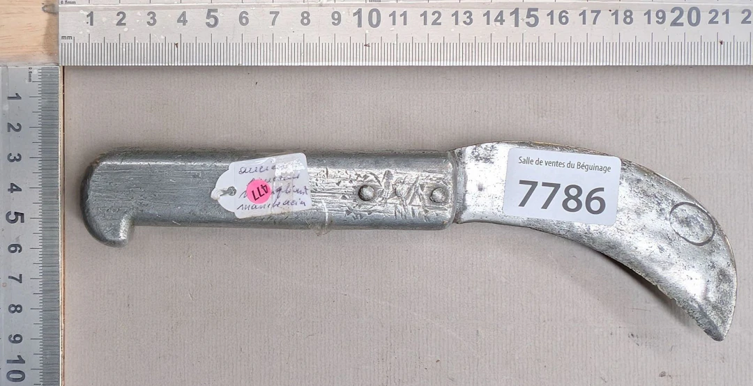 1 vintage non-folding aluminum knife—see photos for dimensions and condition