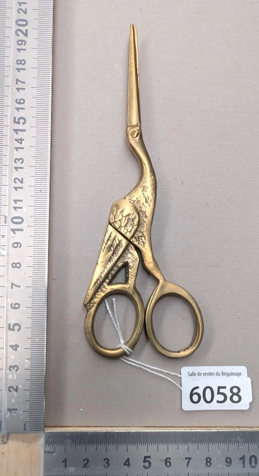 1 pair of stork-shaped scissors made of brass or bronze—see photos