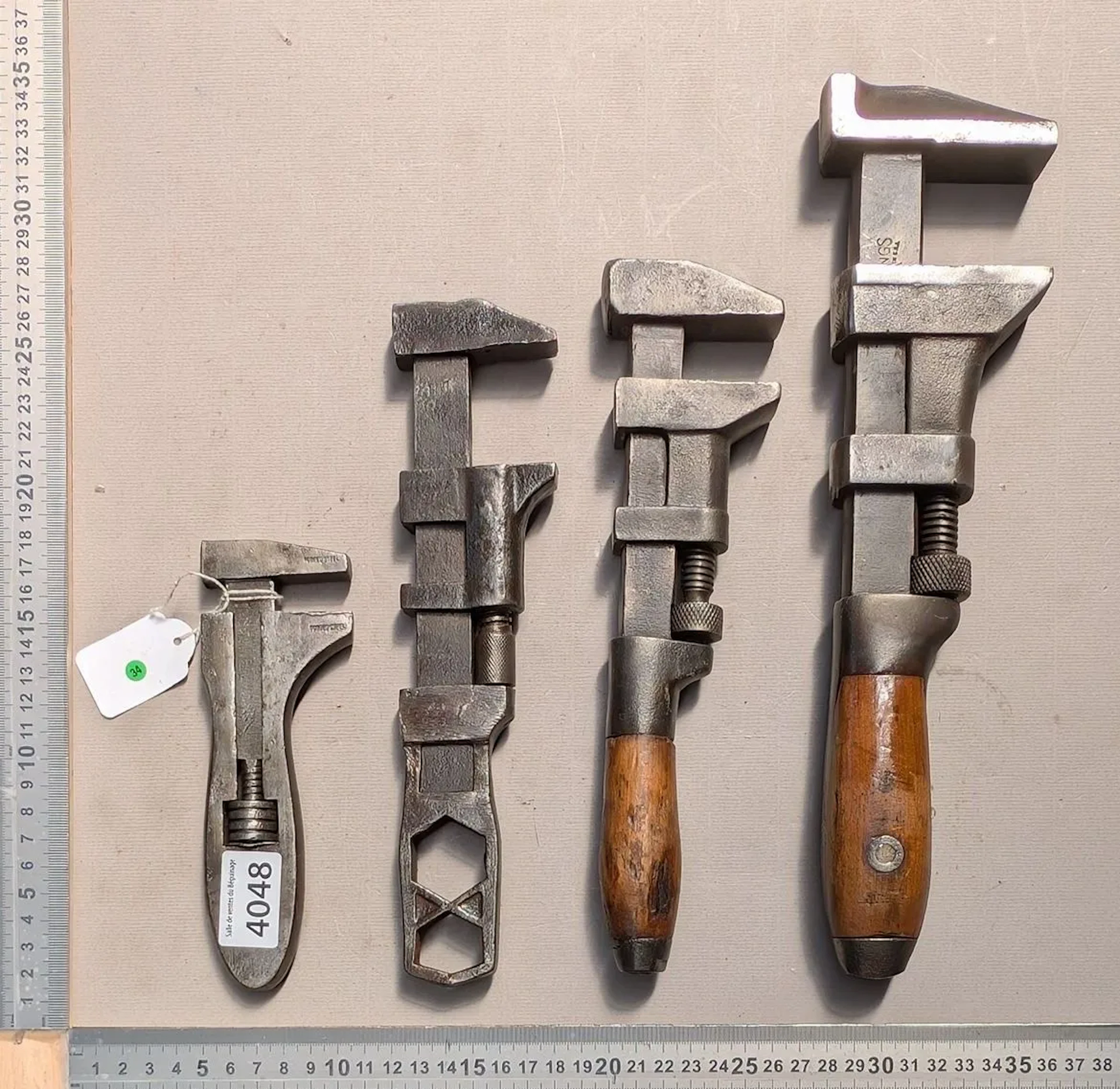 4 adjustable wrenches—see photos for dimensions and condition