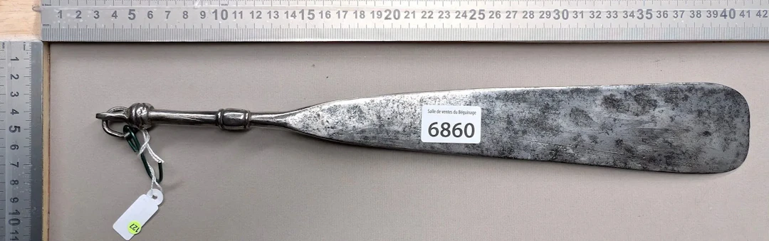 Antique butcher's sharpening knife with steel handle, 17th century—see
