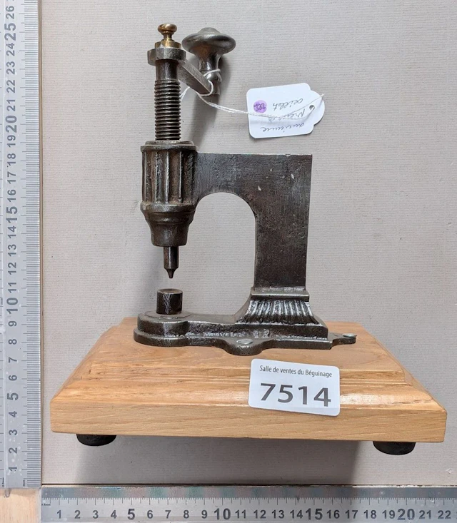1 antique eyelet press—see photos for dimensions and condition
