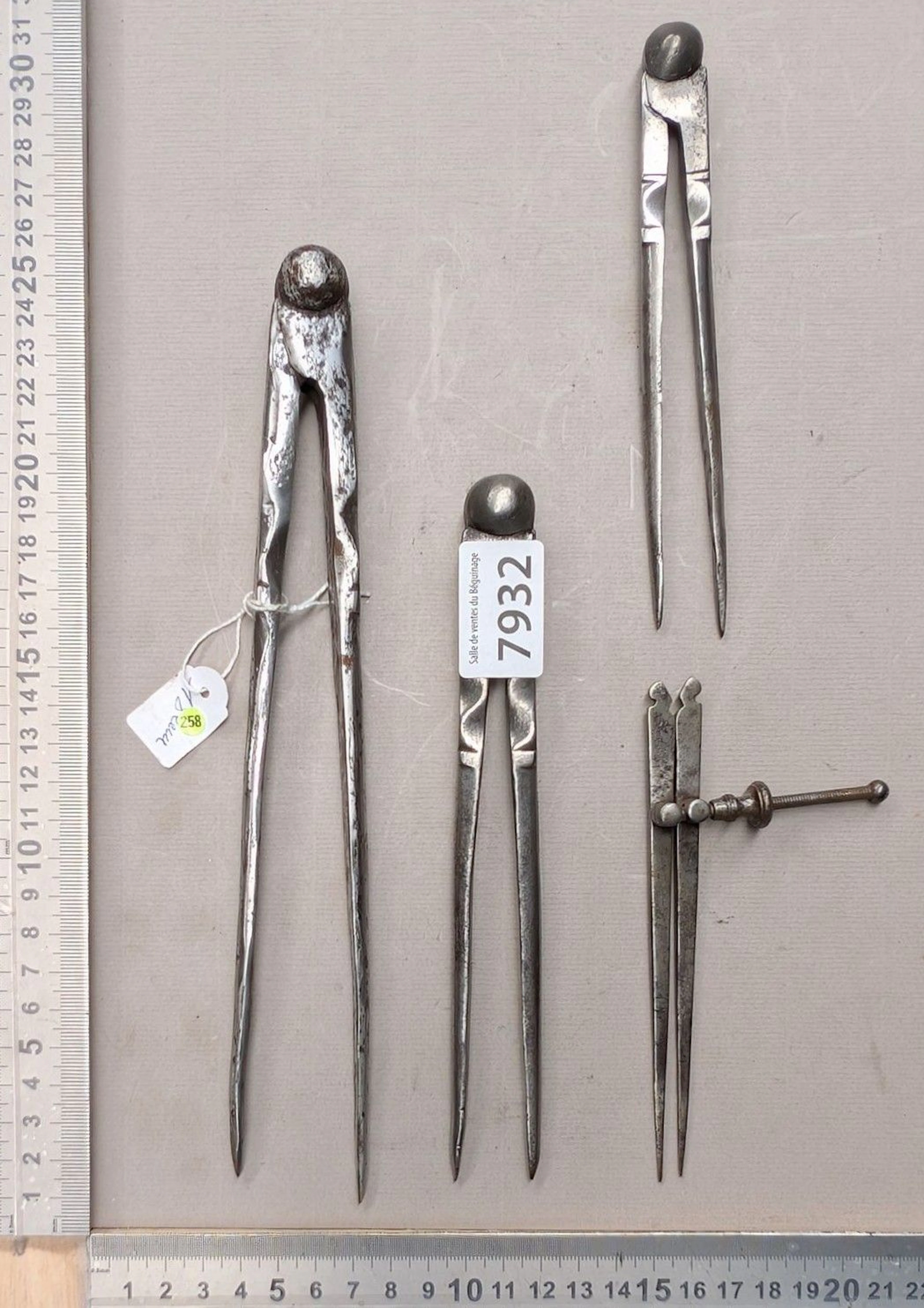 1 set of 4 different wrought-iron compasses—see photos for dimensions