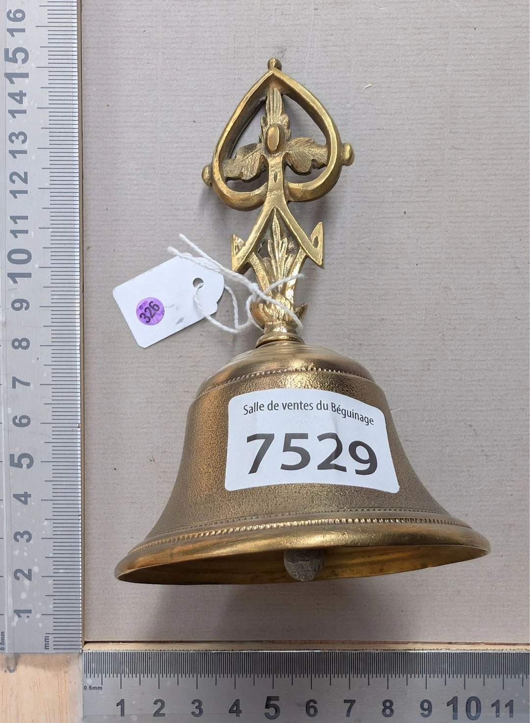 1 pretty little bronze bell—see photos for dimensions and condition