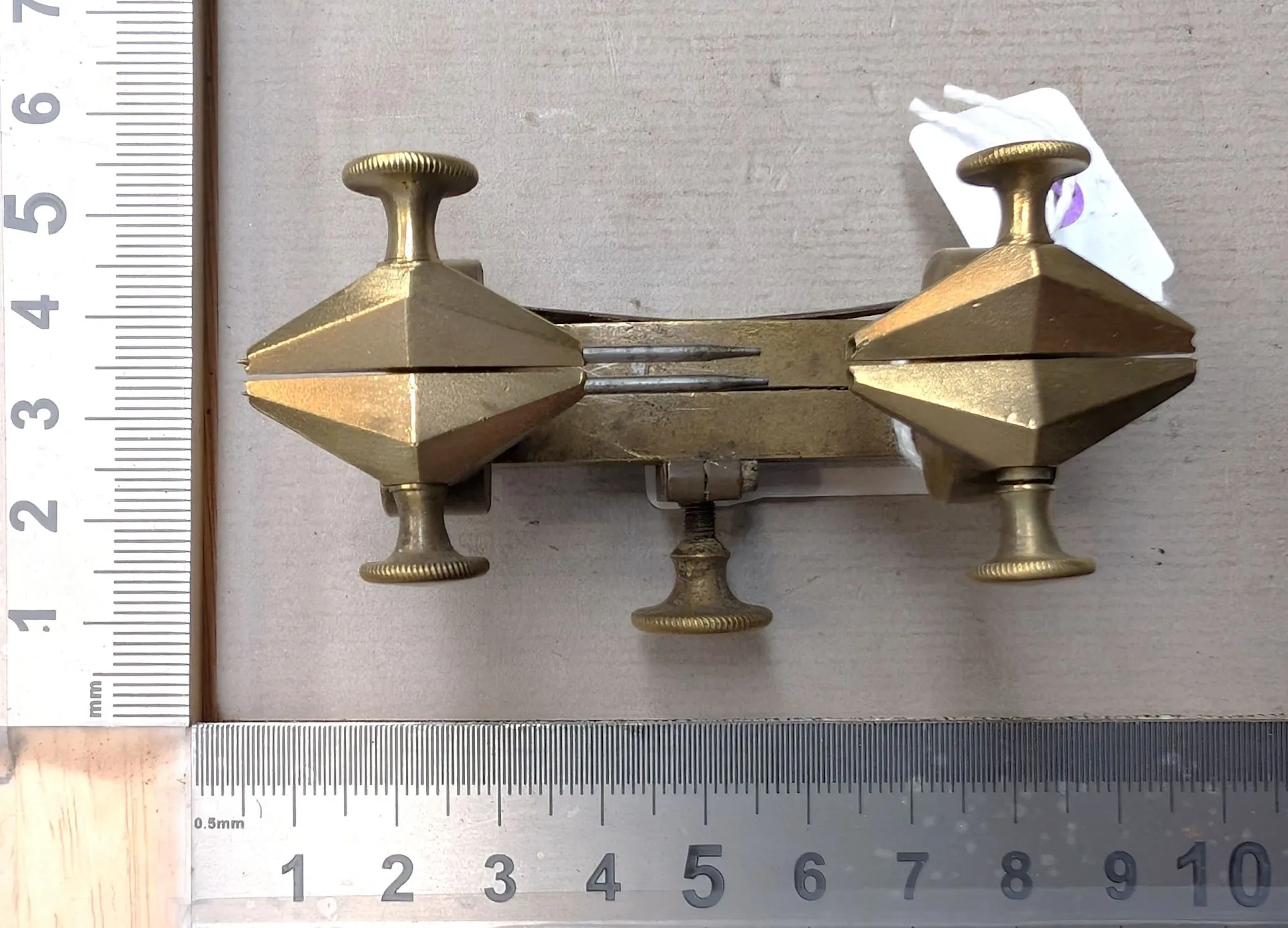 1 bronze watchmaker's compass—see photos for dimensions and condition