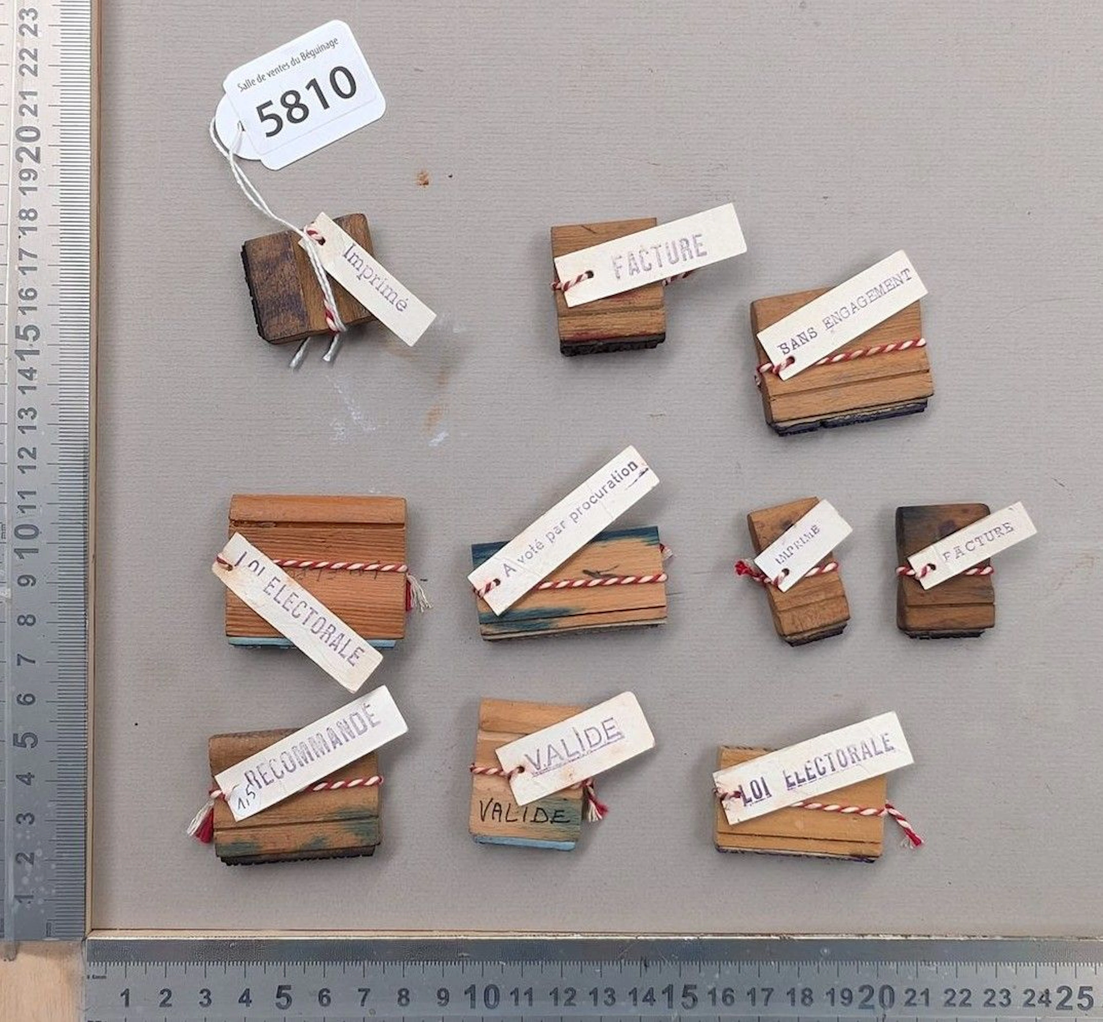 10 wooden stamps—see photos for dimensions and condition