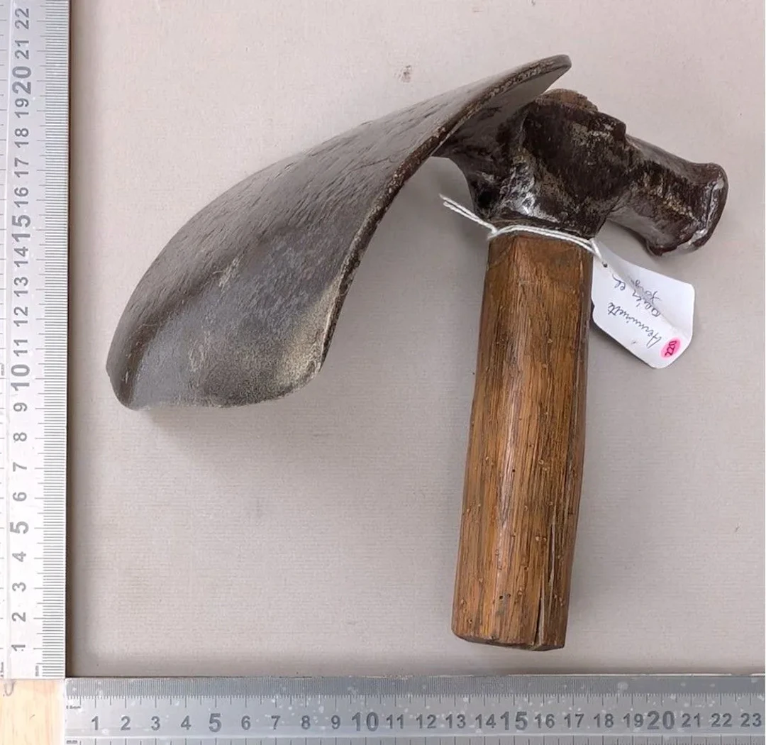 A forged steel adze—see photos for dimensions and condition