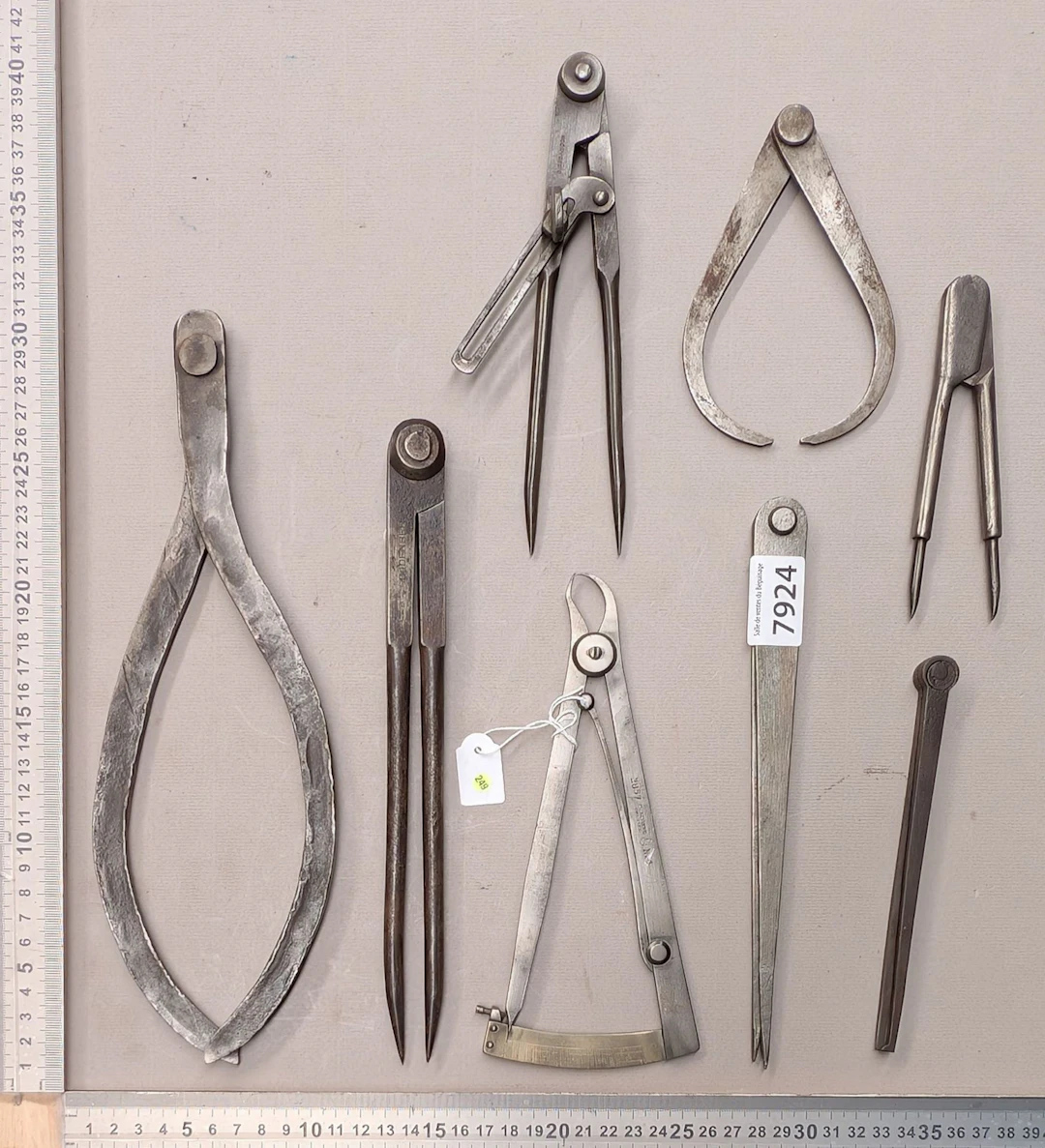 1 set of 8 different compasses—see photos for dimensions and condition