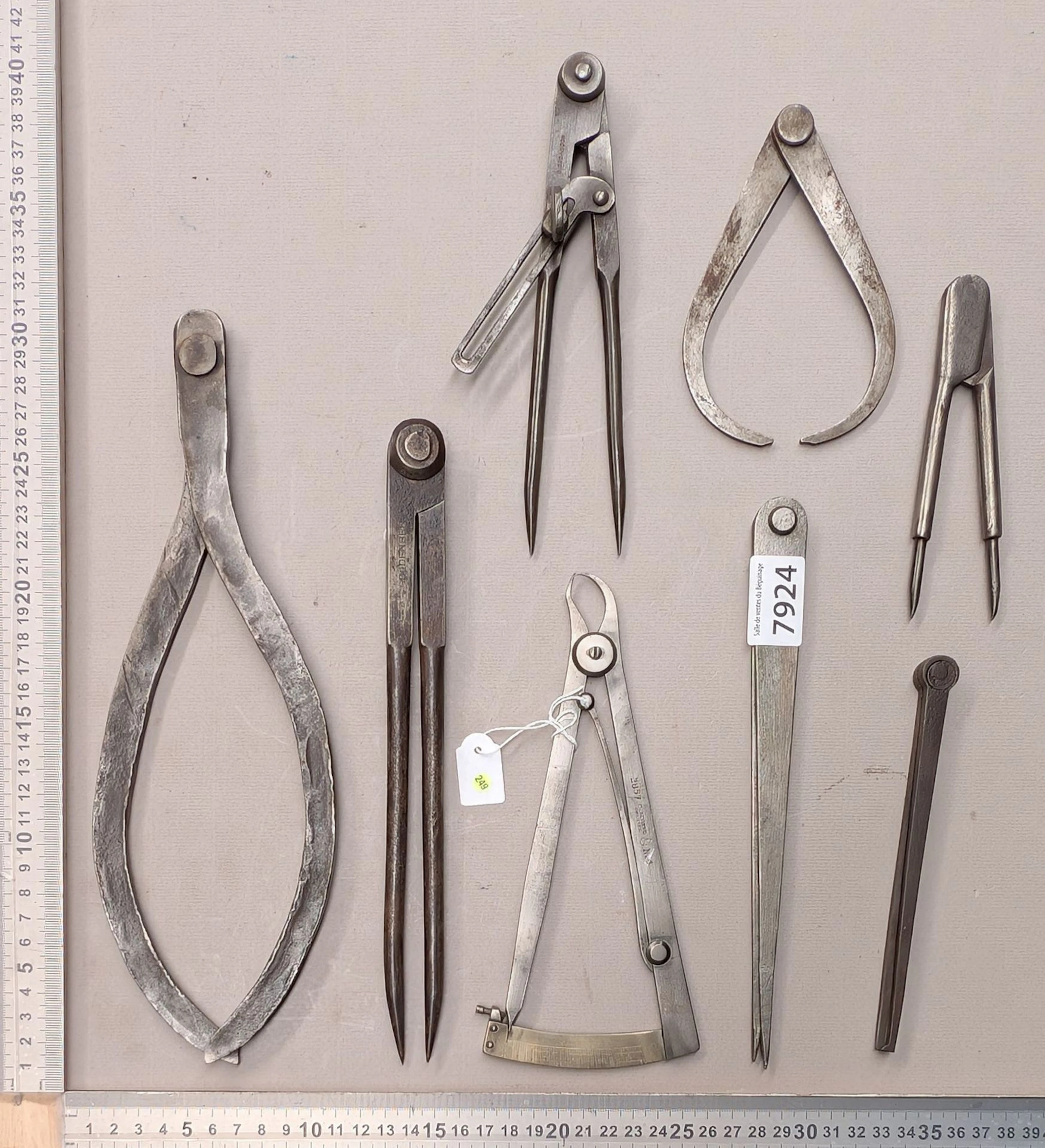 1 set of 8 different compasses—see photos for dimensions and condition