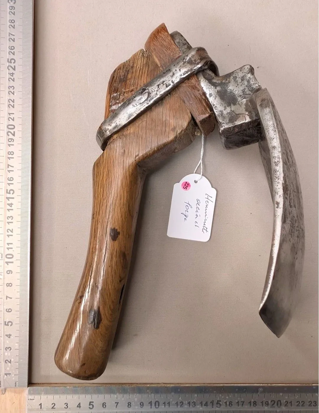 A forged steel adze—see photos for dimensions and condition