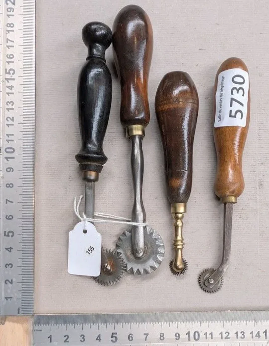 4 forged steel casters with wooden handles—see photos for dimensions