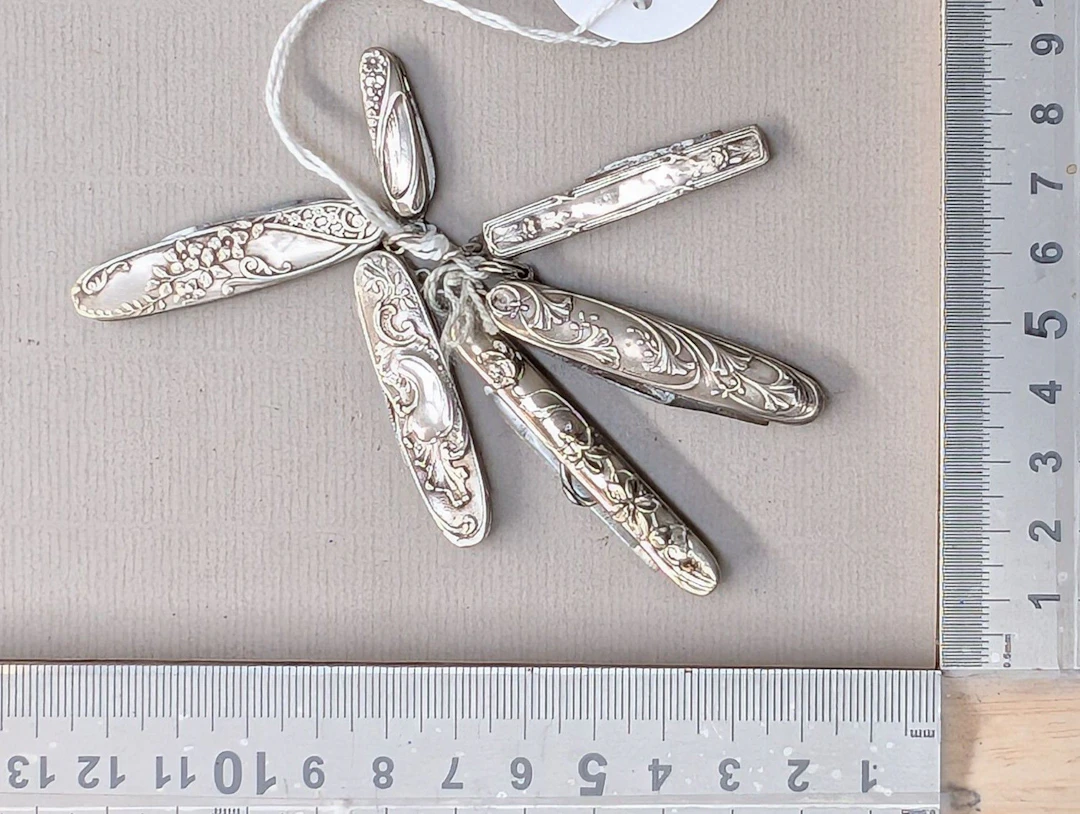 6 small silver knives—see photos for dimensions and condition