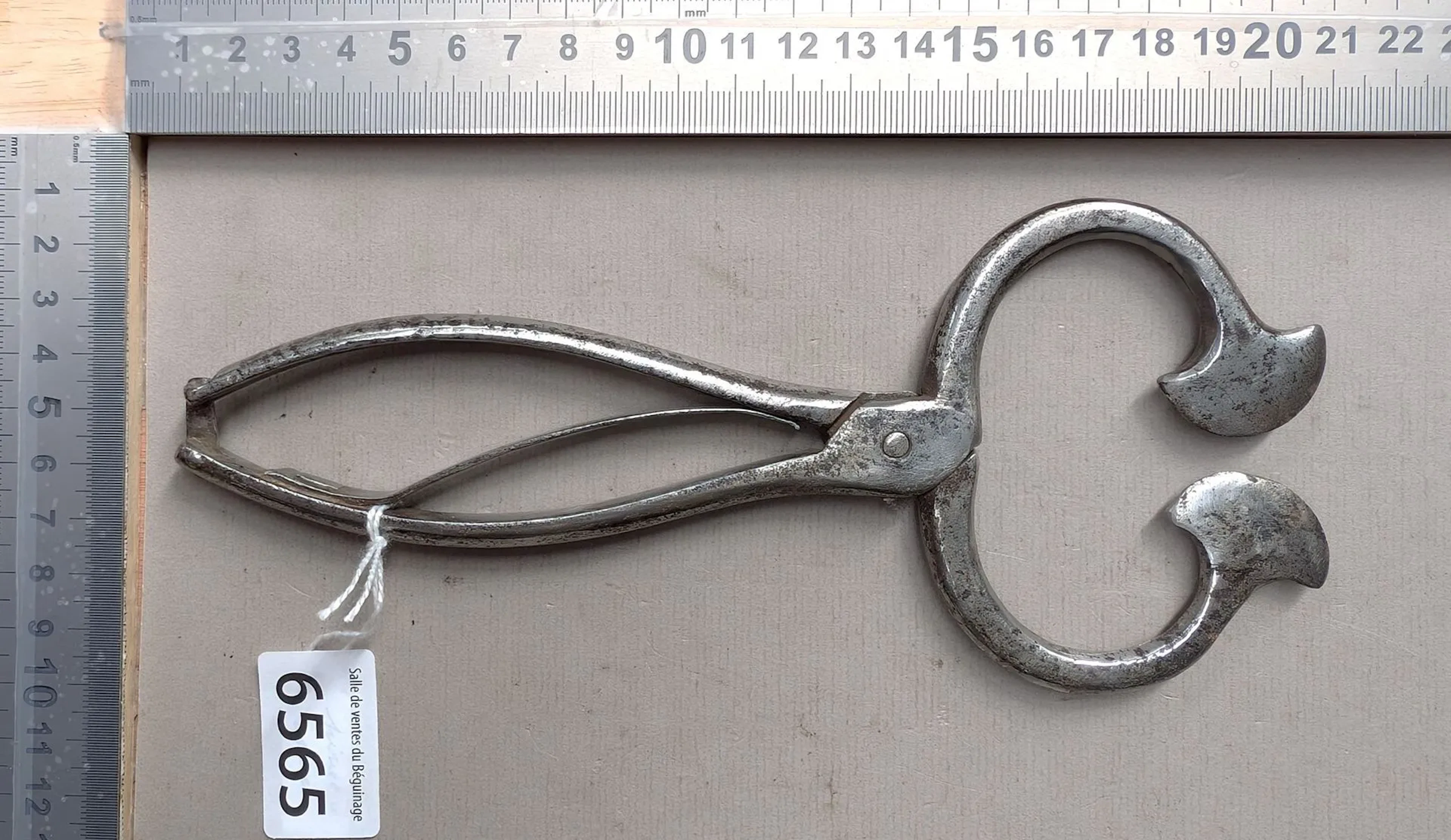 1 antique sugar tongs—see photos for dimensions and condition
