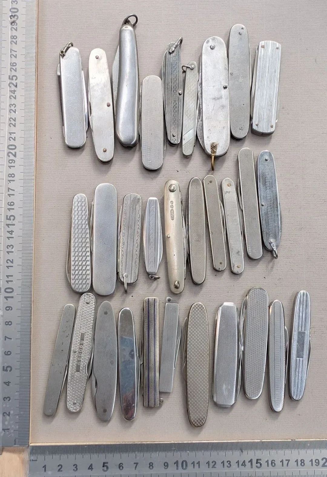 Set of antique pocket knives—see photos for dimensions and condition